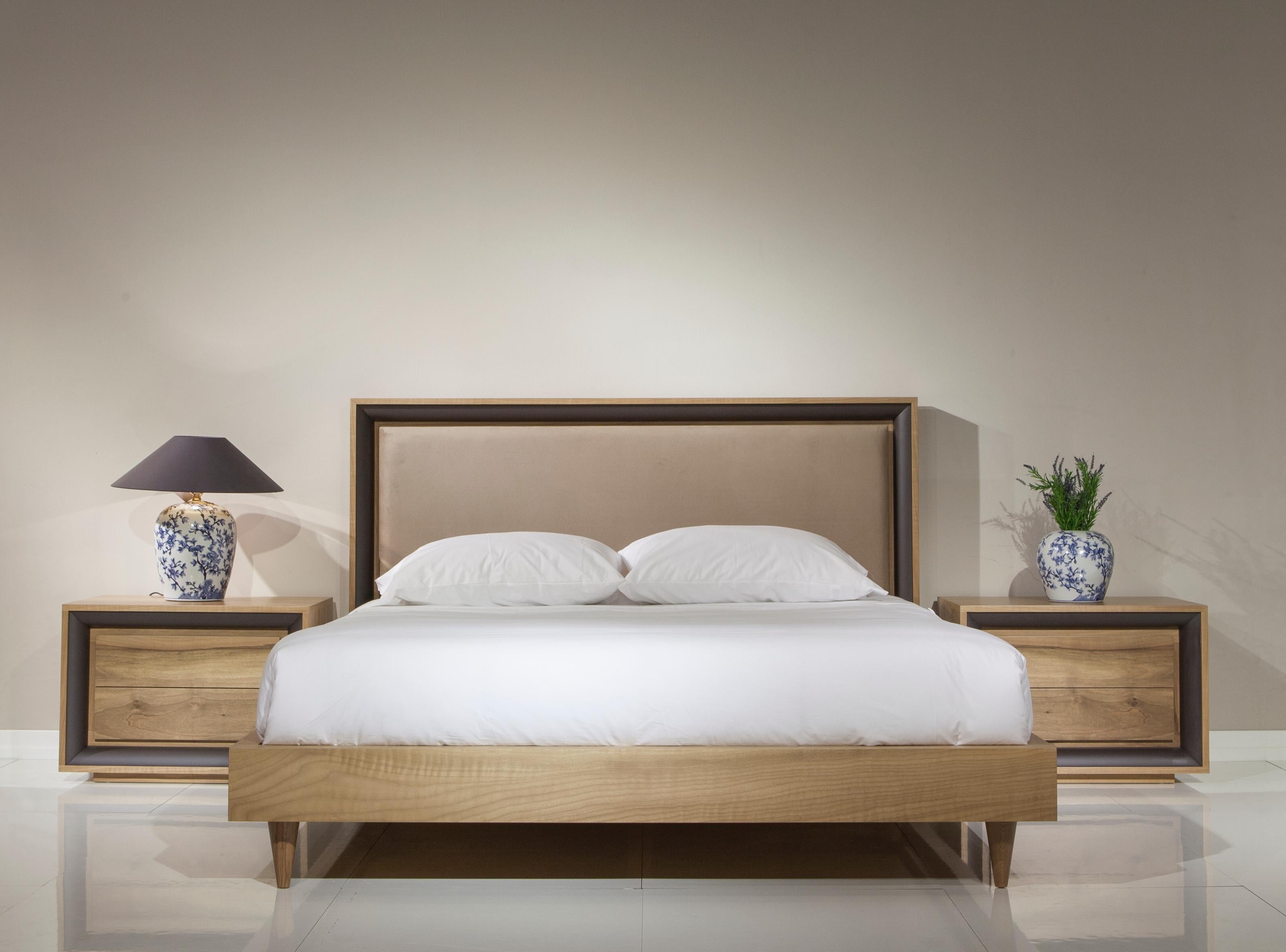 With a fully upholstered headboard, this tailored bed’s slim silhouette features an angled solid wood base that together give it grace and polish.
