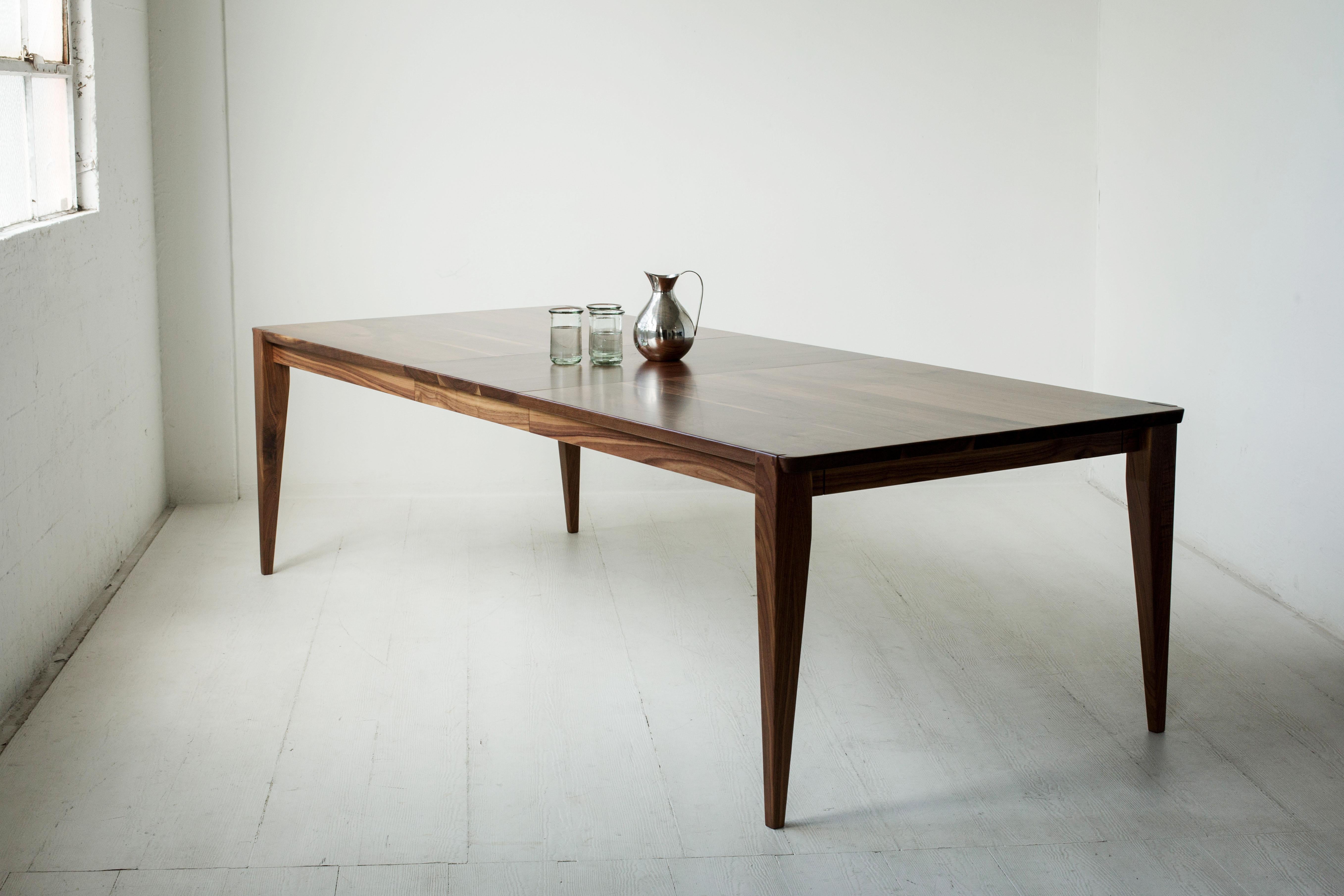 Extend the invitation to more family and friends. Our signature Oslo dining table is an ideal design for Expansion. Featuring our signature beveled edges, tapered legs, and notched joinery, this durable dining table is handcrafted with precision,