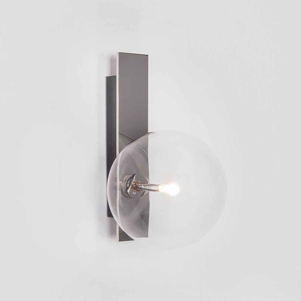Oslo Wall sconce by Schwung
Dimensions: W 15 x D 19 x H 26 cm
Materials: Polished nickel, hand blown glass globes

Finishes available: Black gunmetal, polished nickel, brass
Other sizes available.

 Schwung is a german word, and loosely