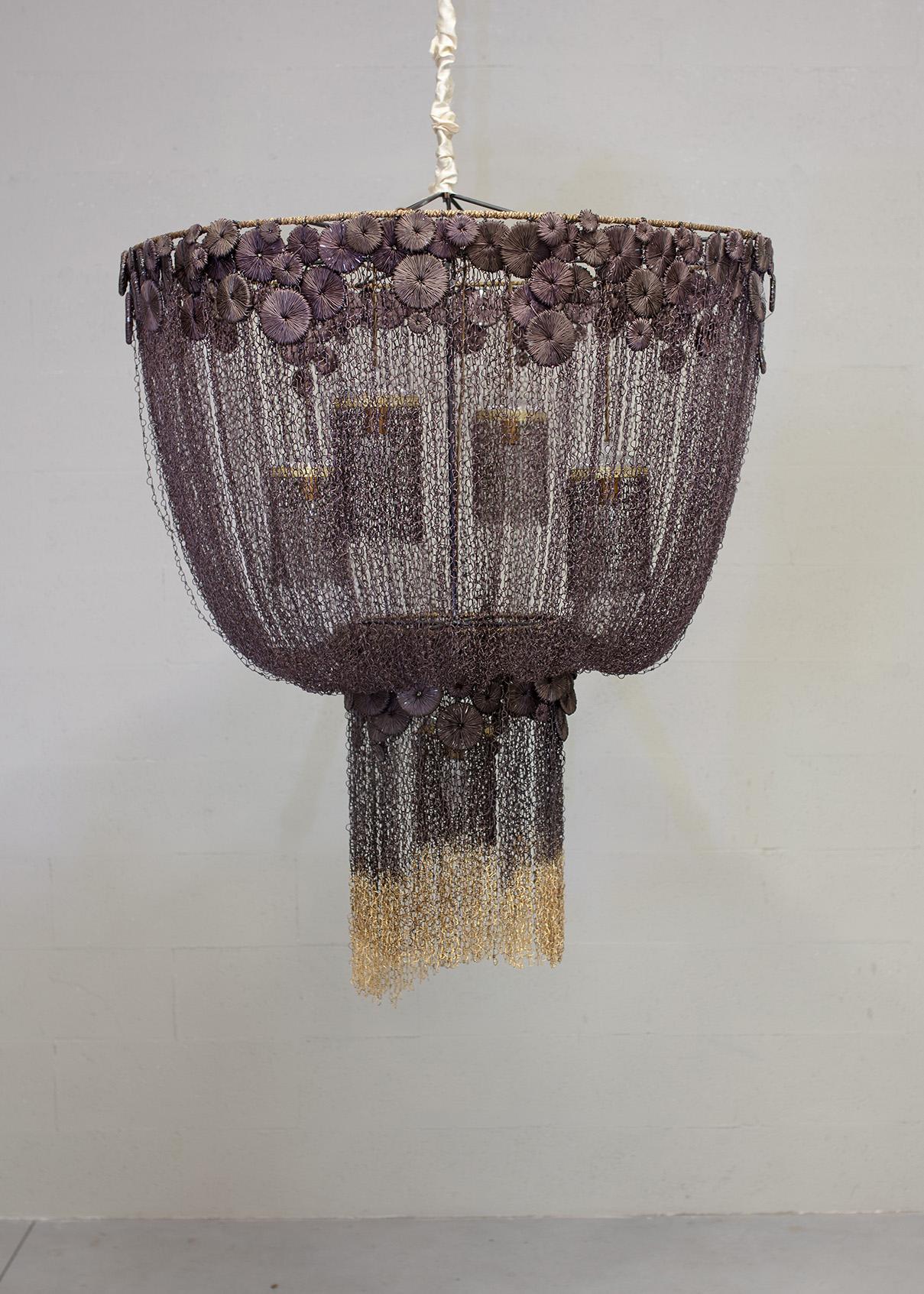 Osman Chandelier by Valentina Giovando
Dimensions: D 80 x H 97 cm.
Materials: Iron, Glass.  

Valentina Giovando, Lives and works in Sarzana, in Liguria, and for over 20 years she dedicated herself to the production of a new style. Her style is