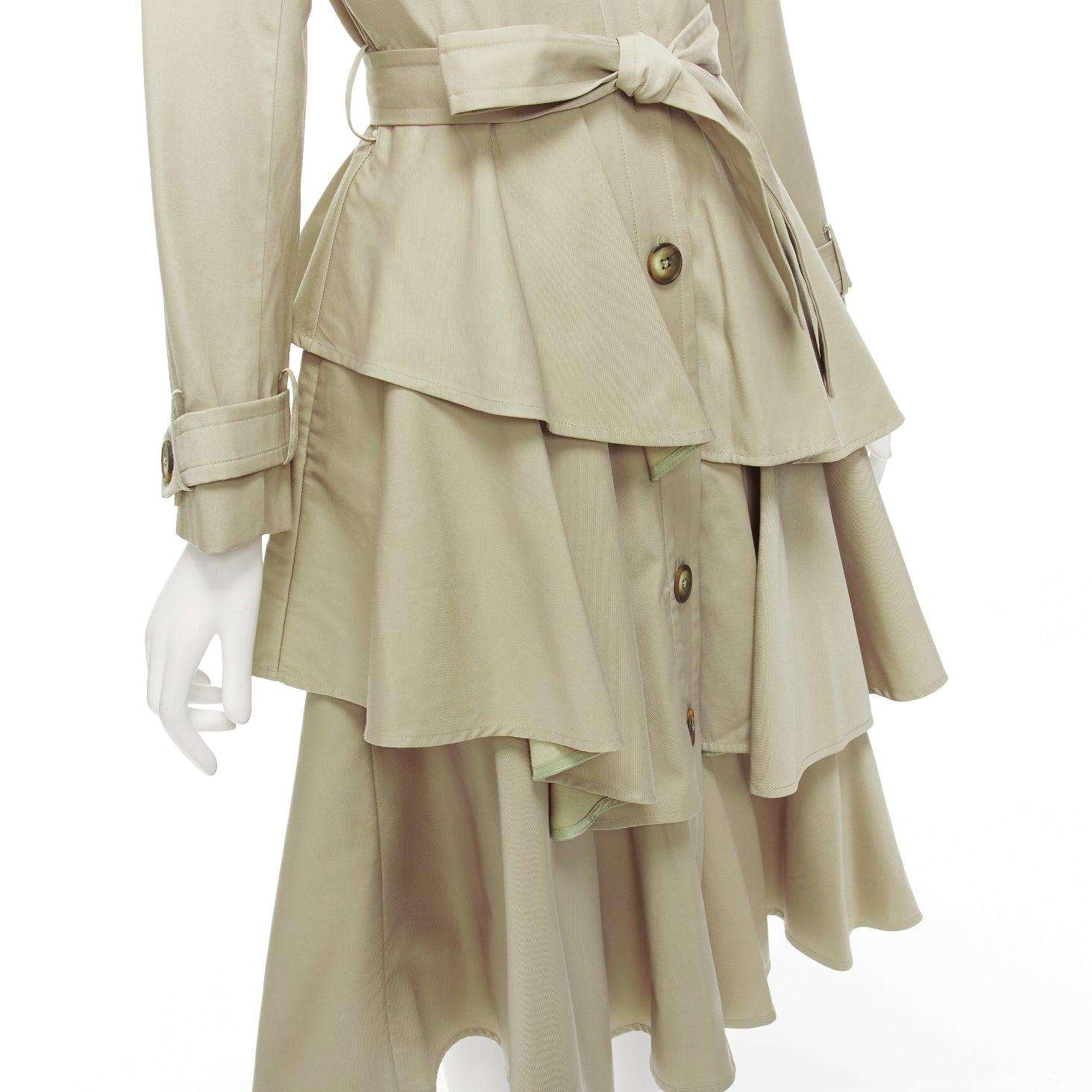 OSMAN LONDON khaki cotton tiered ruffle capelet belted long trench coat XS
Reference: AAWC/A00715
Brand: Osman
Material: Cotton, Blend
Color: Khaki
Pattern: Solid
Closure: Belt
Lining: Khaki Fabric
Made in: Portugal

CONDITION:
Condition: Very good,