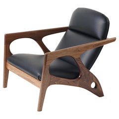 Fauteuil de salon Osprey avec cadre en noyer et tapisserie en cuir