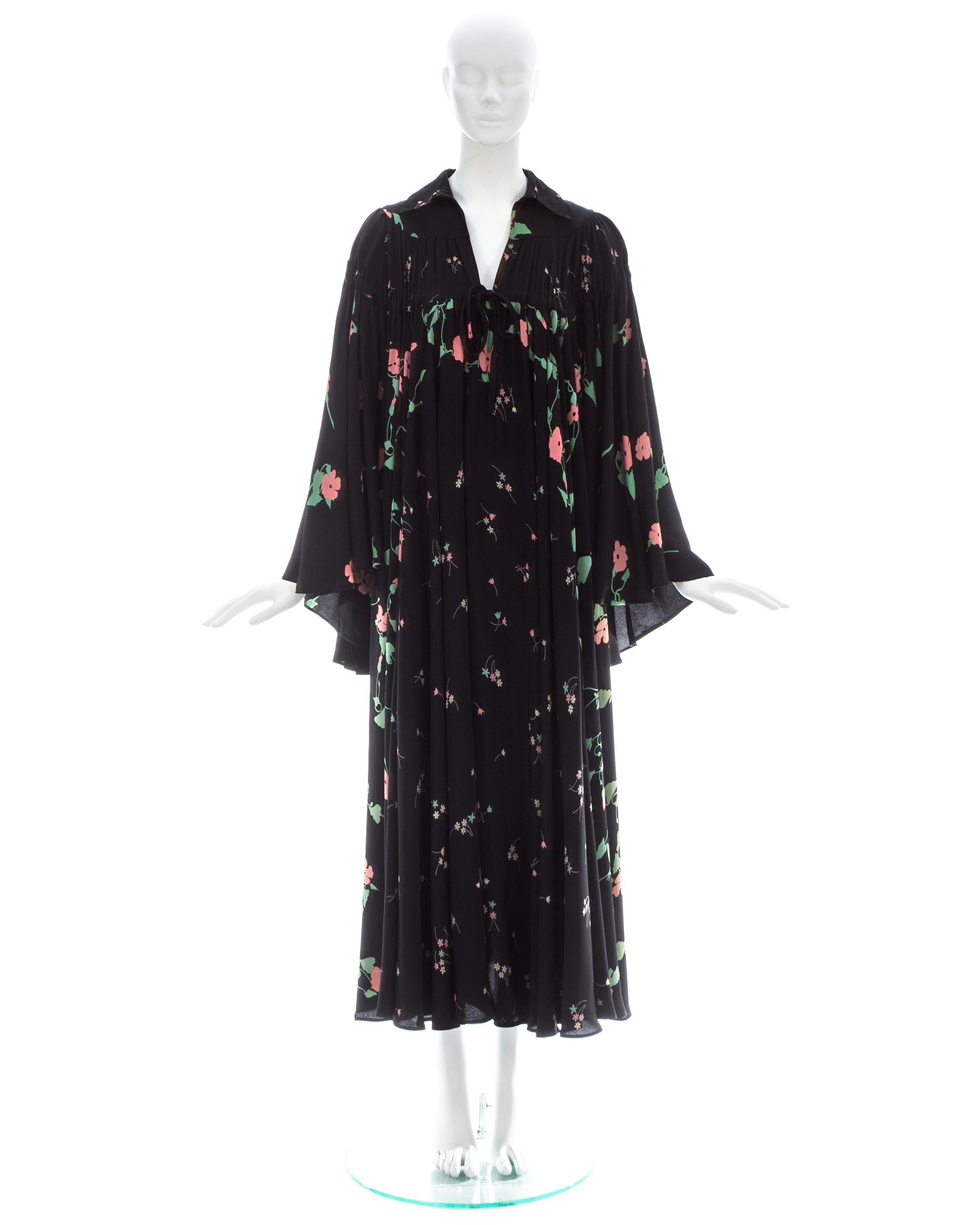 Ossie Clark; Black silk bell sleeve dress with 'Busy Lizzie' print by Celia Birtwell and drawstring fastening on yoke 

Spring-Summer 1971