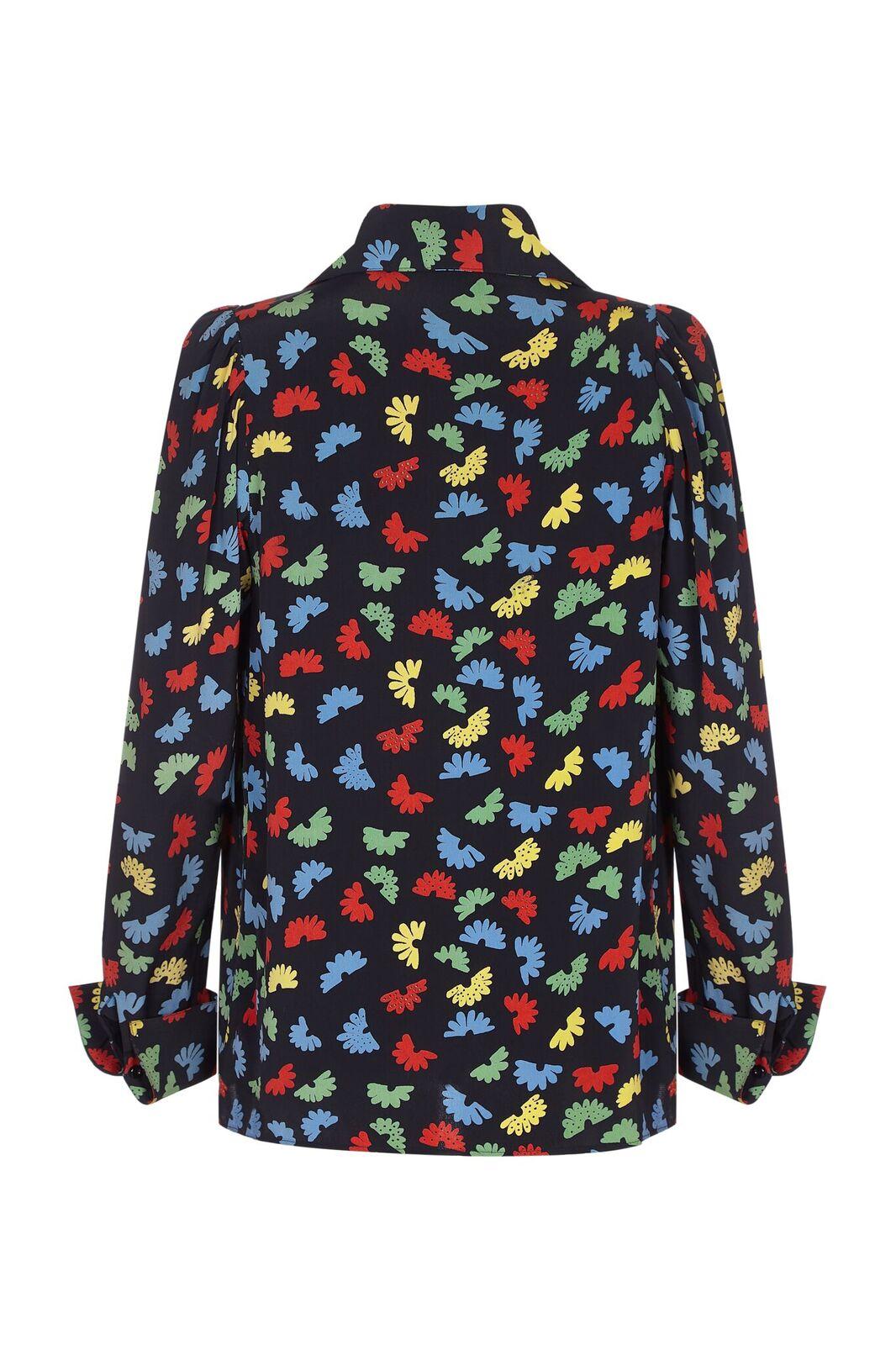 This vibrant Ossie Clarke 1960s blouse with abstracted floral print by celebrated textile designer Celia Birtwell is part of the designer's rare main line label and is therefore a collectable piece of fashion history. Clark's flamboyant designs