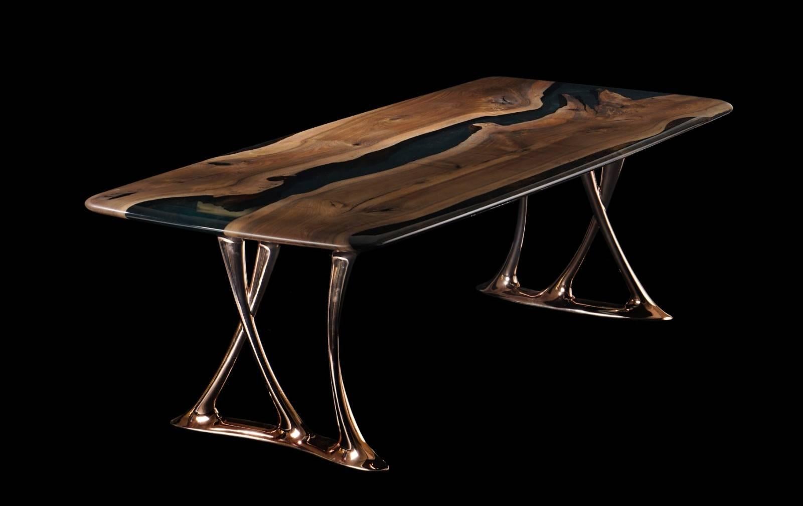 The ‘Osso 270' as made in Ankara, Turkey with walnut wood. The wood is kilned and dried prior to being filled with high-quality resin. The edges are rounded to perfection and have copper-colored aluminum legs. 

Measures: Length 105