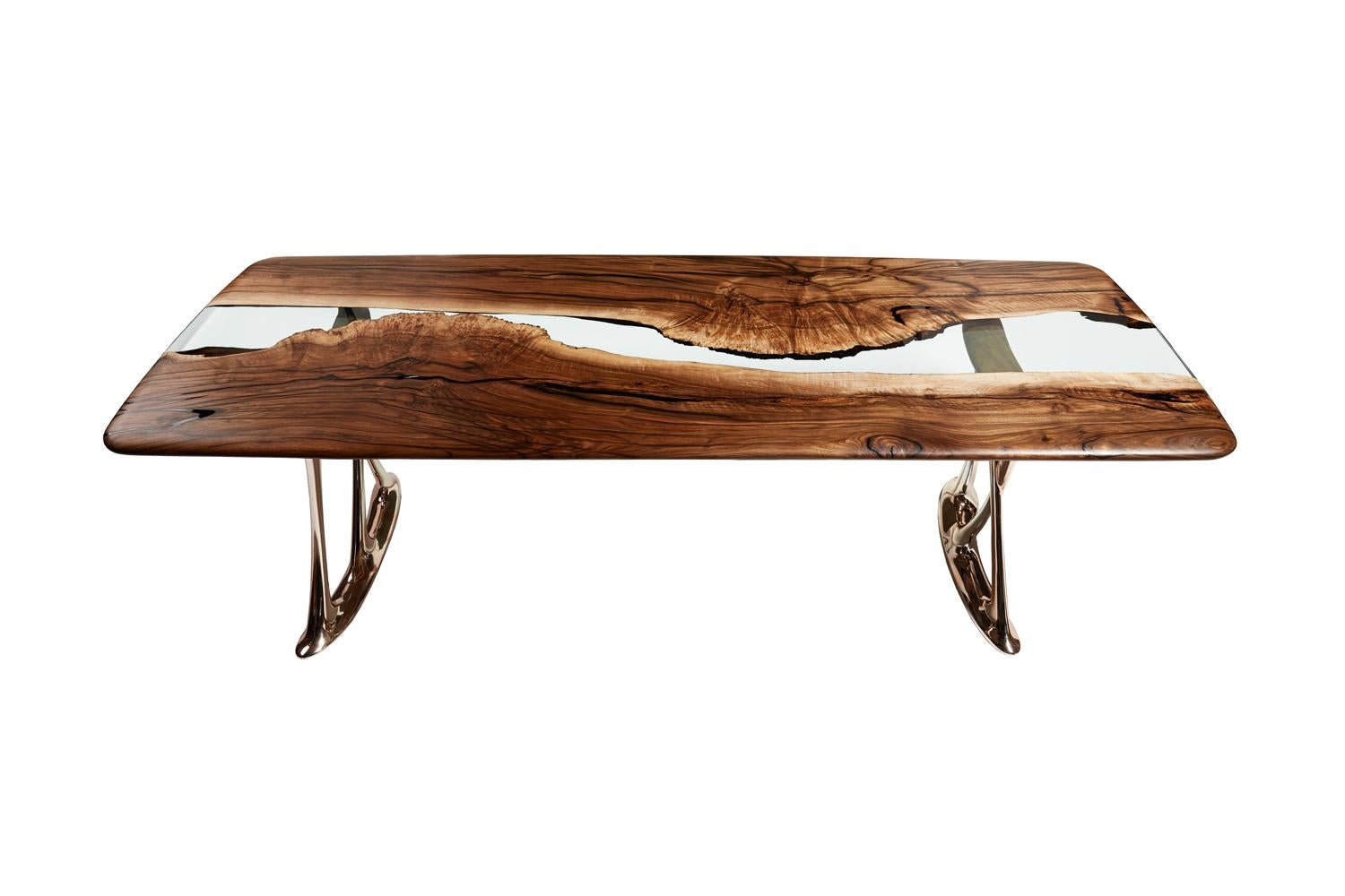 The ‘Osso 270' as made in Ankara, Turkey with walnut wood. The wood is kilned and dried prior to being filled with high-quality resin. The edges are rounded to perfection and have copper-colored aluminum legs.
 
