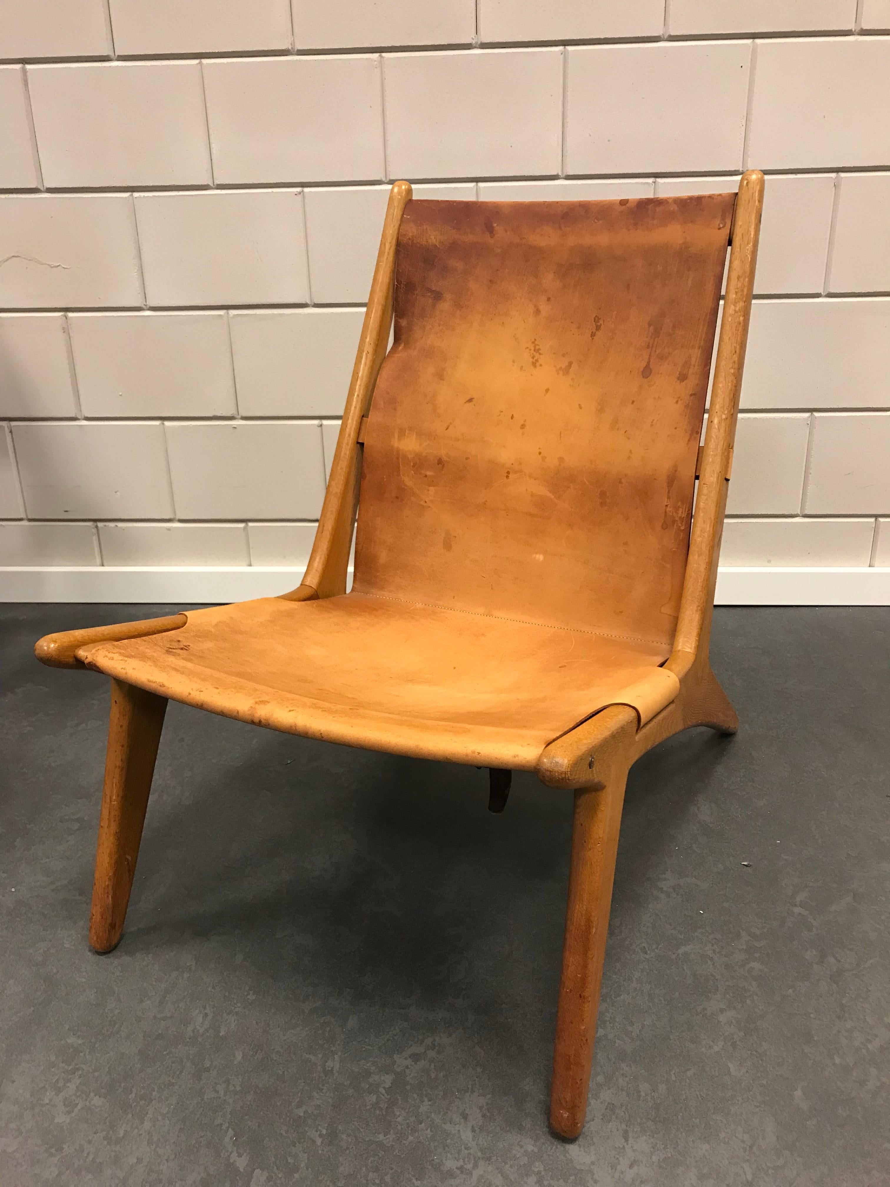 Swedish natural leather hunting chair design by Osten Kristansson 1954 for Luxus
very nice condition.