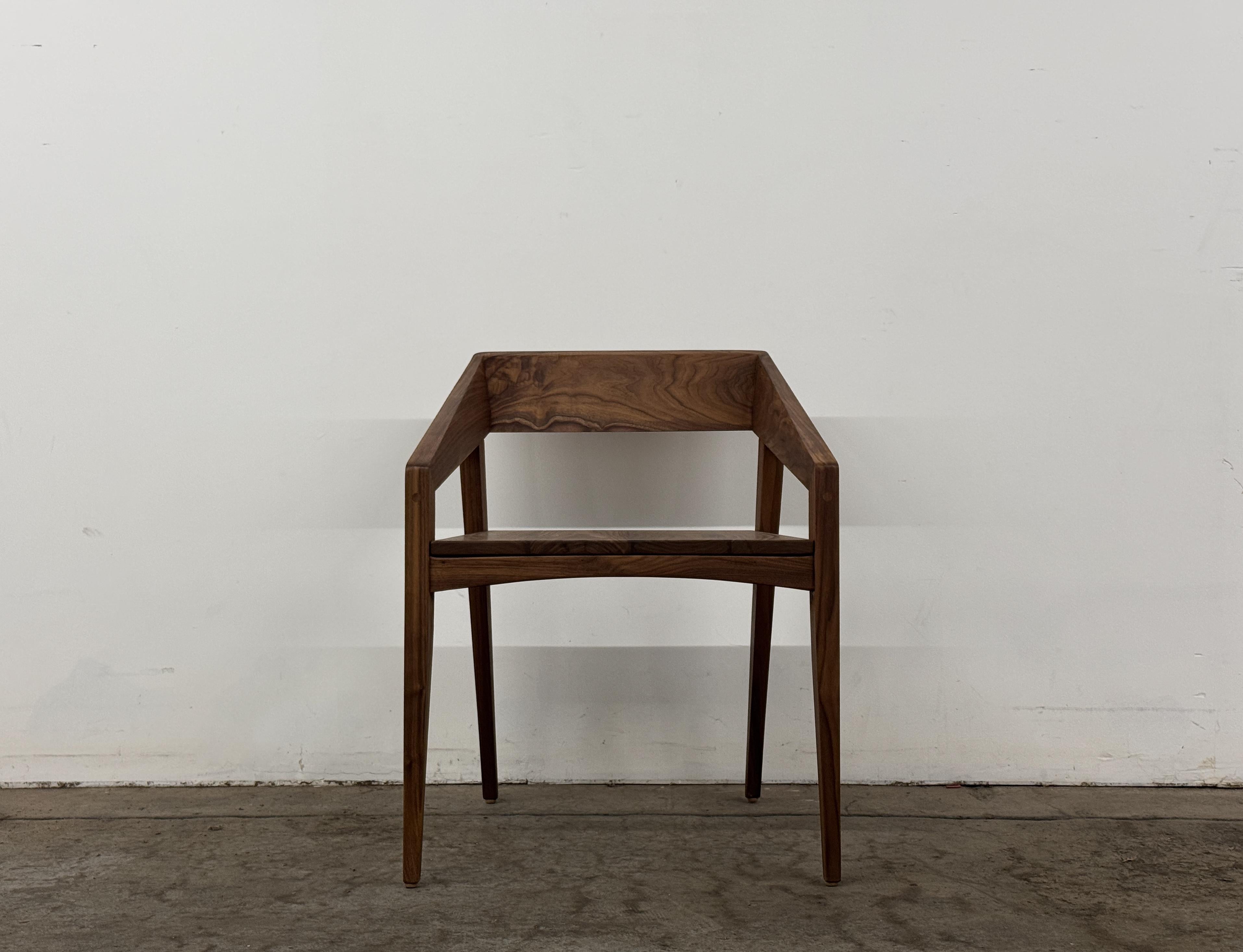 The Osteria dining chair is designed to work with modern/contemporary dining areas, as well as rustic/reclaimed farmhouse style tables, especially Parsons tables.  The backrest and arms have gently faceted surfaces for a distinctly sharp,