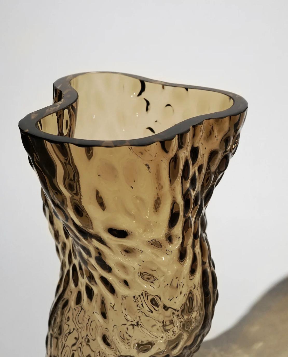 The Ostrea vase by Hein Studio is inspired by the sea’s infinite treasures — the light reflections of rock formations and oysters — transformed into an organic collection of small objects designed to beautify, ease, and soothe everyday life.

The