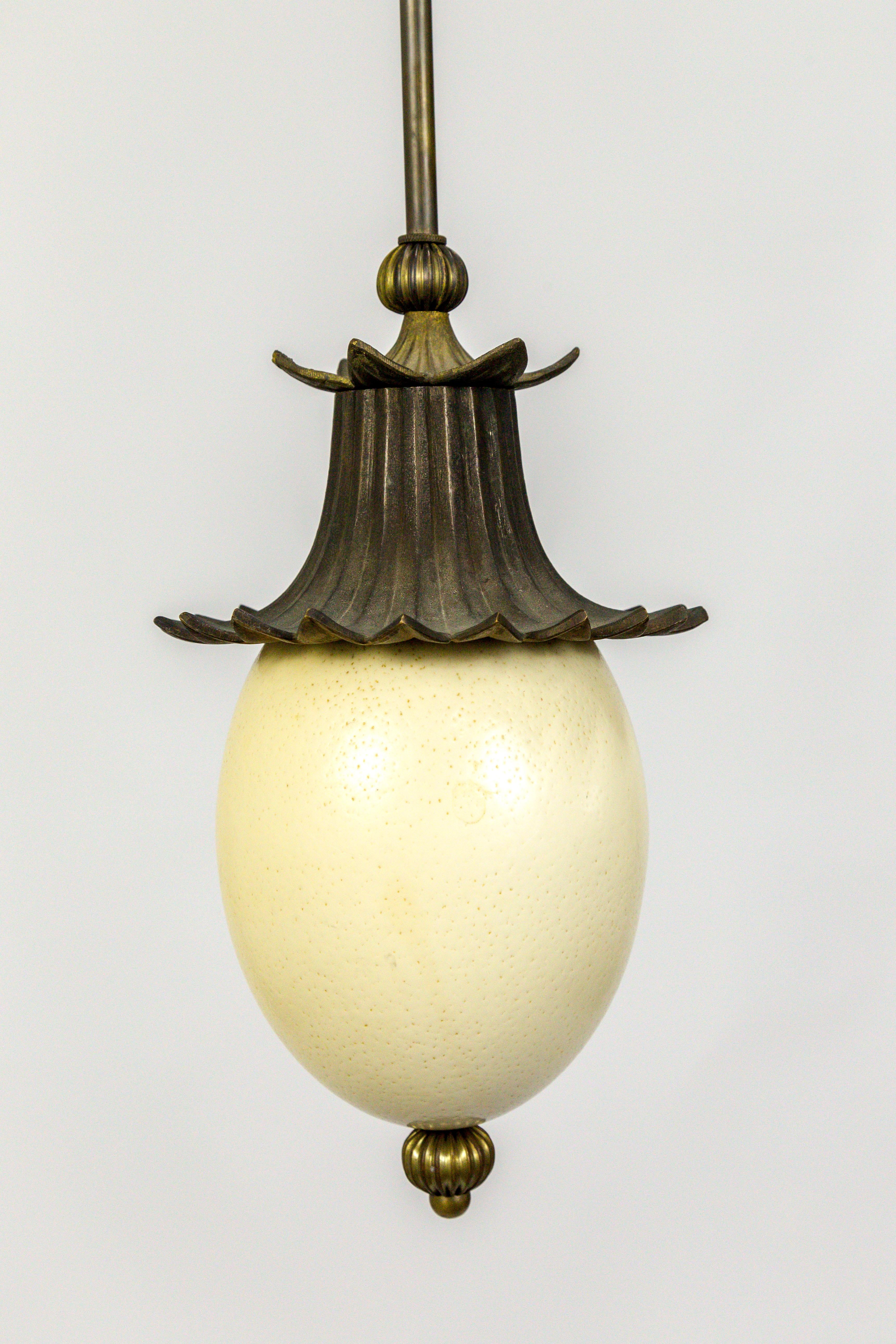 Metal Ostrich Egg and Antique Brass Pagoda Pendant