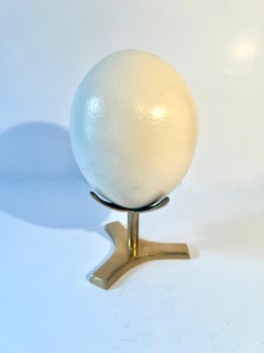 Ostrich Egg Displayed on Solid Brass Four Footed Stand