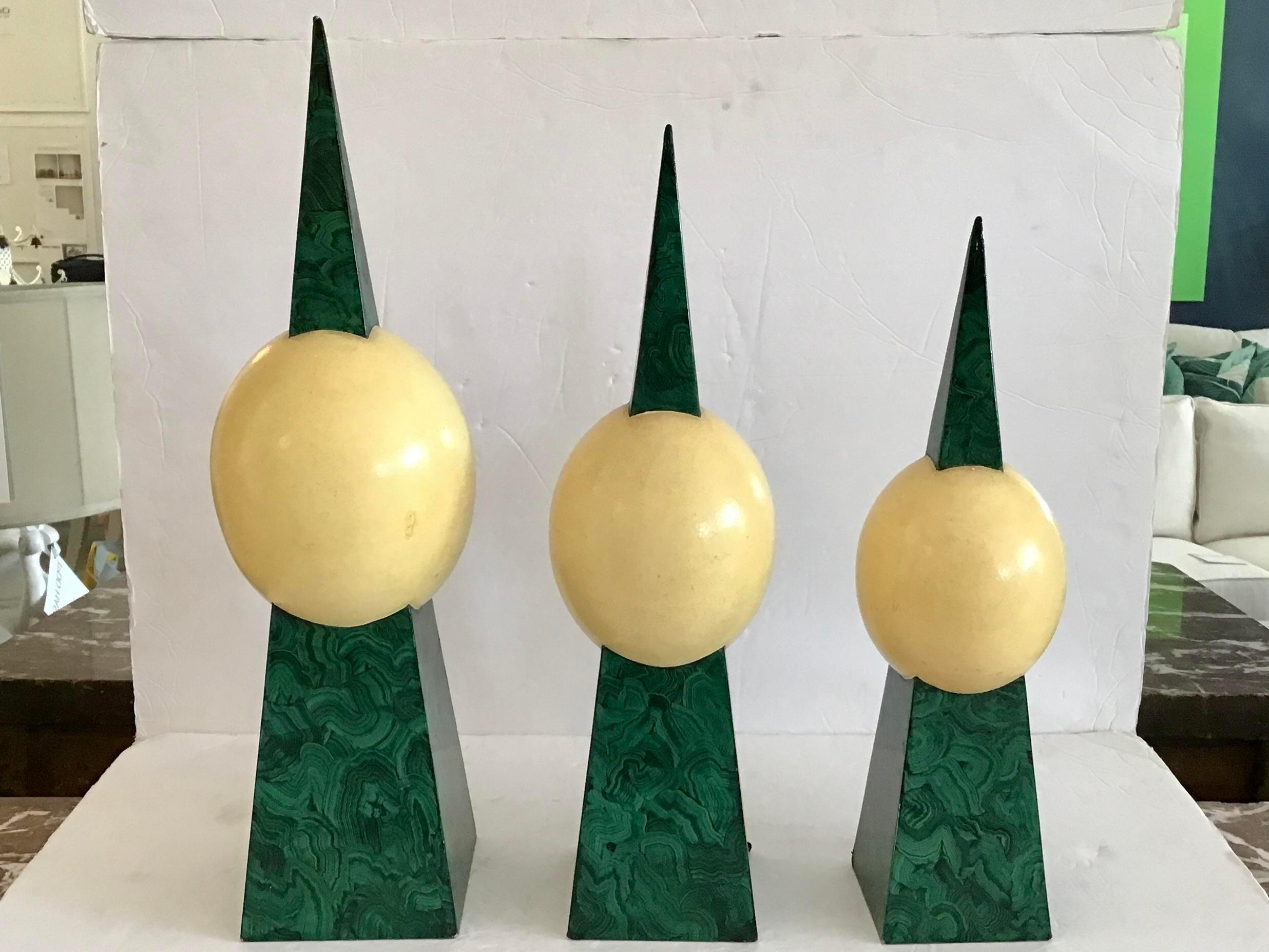 Very nice set of 3 Ostrich Eggs centerpiece Faux malachite obelisks in different sizes. Great addition to your table tops.

Additional dimensions:
-Tall: 5