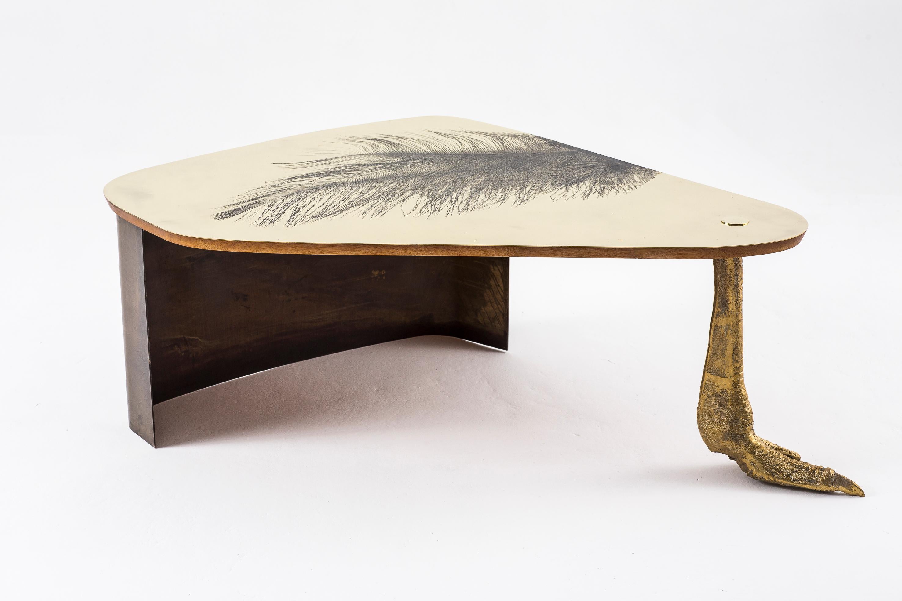 Ostrich Foot coffee table by Egg Designs
Dimensions: 120 L X 86 D X 43 H cm
Materials: Sand Cast Solid Brass, Etched Brass Sheet, Timber

Founded by South Africans and life partners, Greg and Roche Dry - Egg is a unique perspective in