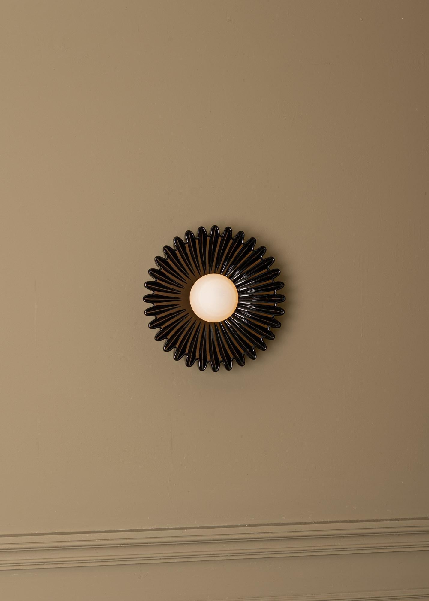 Ostro Black Ceramic Wall Sconce by Simone & Marcel
Dimensions: D 17 x W 31 x H 31 cm.
Materials: Ceramic and glass.

Available in different ceramic and marble options and finishes. Custom options available on request. Please contact us. 

All our