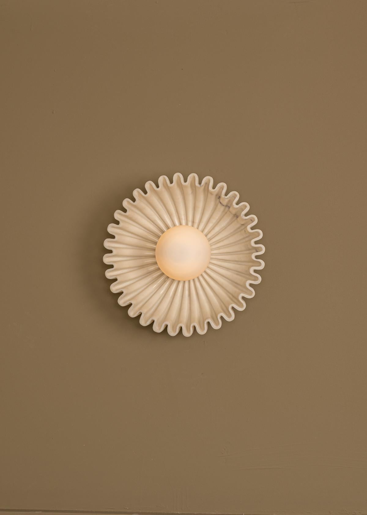 Ostro Ecru Ceramic Wall Sconce by Simone & Marcel
Dimensions: D 17 x W 31 x H 31 cm.
Materials: Marble and glass.

Available in different ceramic and marble options and finishes. Custom options available on request. Please contact us. 

All our