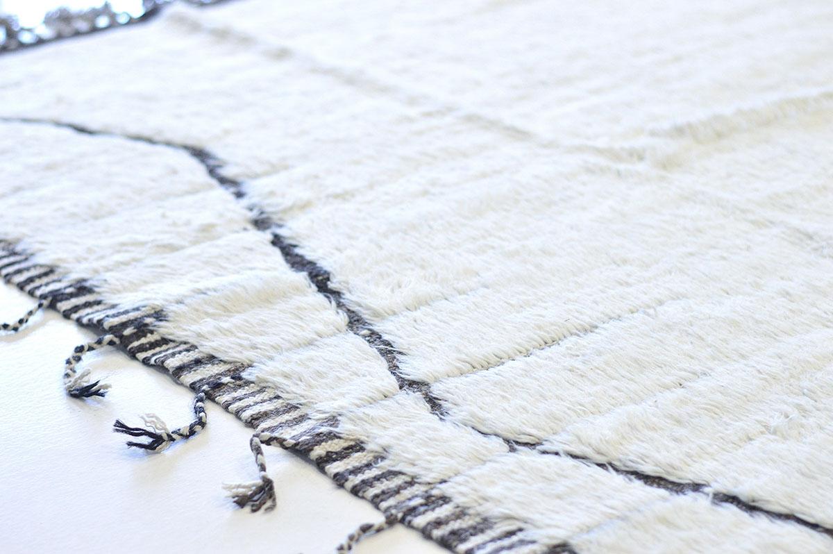 Haute Bohemian Collection: designed in California, named for the winds knitting together seasons, trees, dwellers of coastal communities. Luxurious handwoven wool rug made of the perfect white. See why the Haute Bohemian Collection has become an LA
