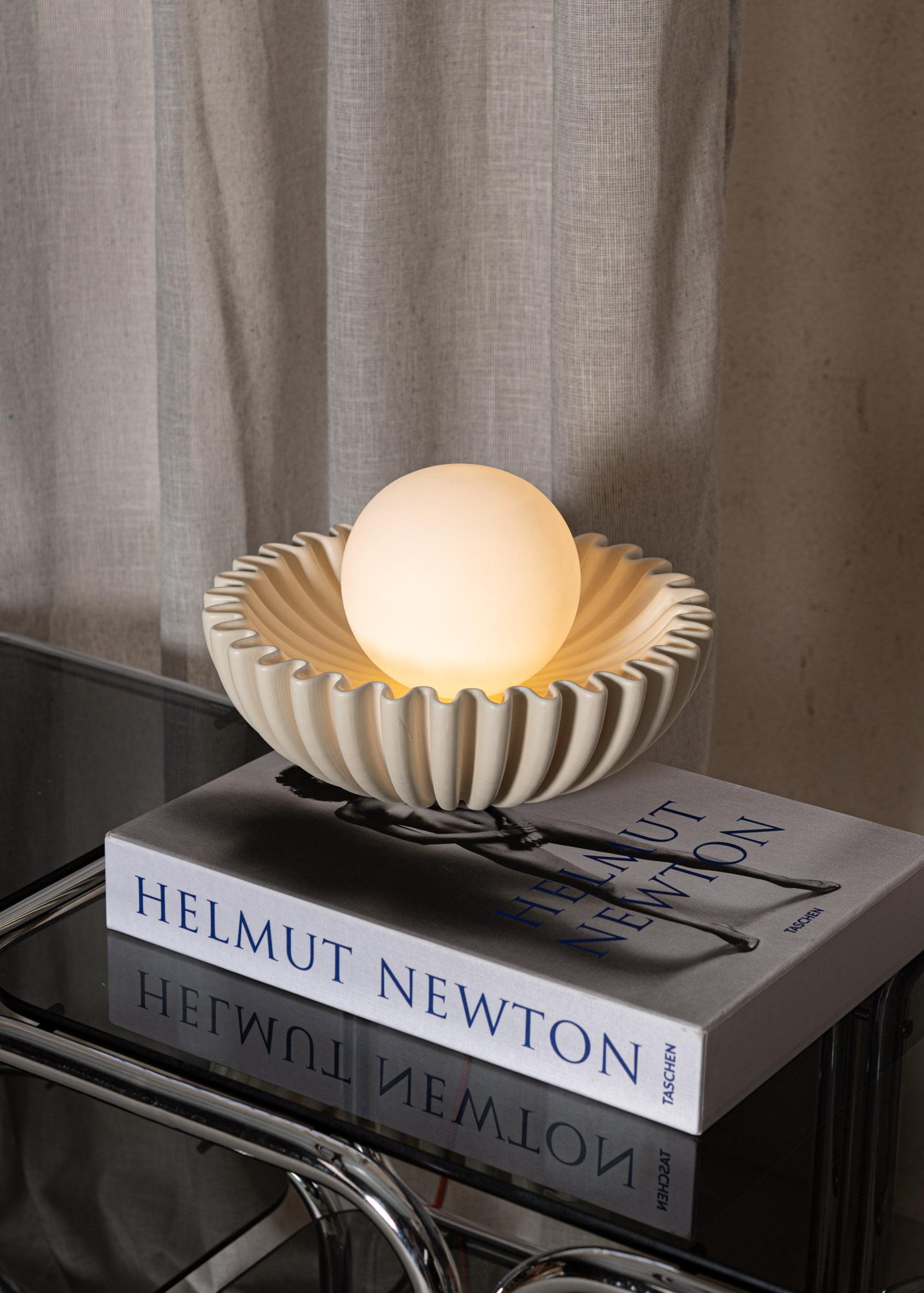 Ostro Sea Ceramic Table Lamp by Simone & Marcel
Dimensions: Ø 31 x H 20 cm.
Materials: Opal matt glass and ceramic.

Custom options available on request. Please contact us. 

All our lamps can be wired according to each country. If sold to the USA