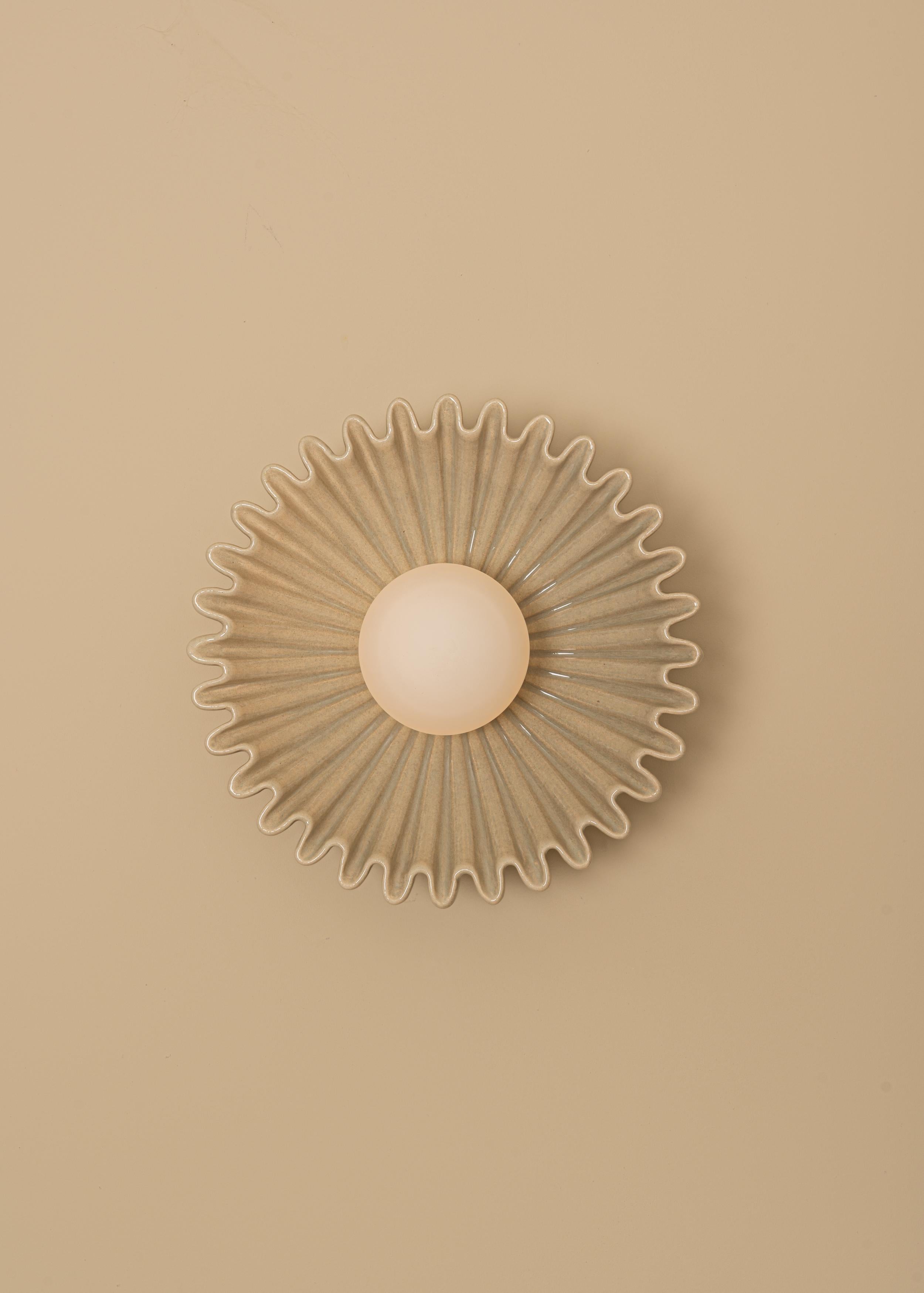 Ostro Sea Ceramic Wall Sconce by Simone & Marcel
Dimensions: D 17 x W 31 x H 31 cm.
Materials: Ceramic and glass.

Available in different ceramic and marble options and finishes. Custom options available on request. Please contact us. 

All our