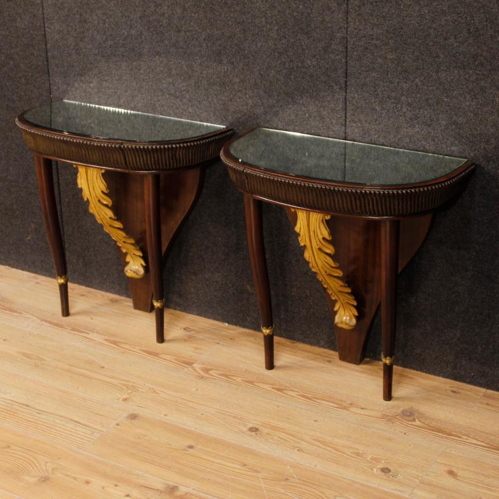 Pair of Italian bedside tables from the 1950s-1960s. Carved and lacquered furniture based on a design by Osvaldo Borsani of nice line and pleasant decor. Bedside tables equipped with a front drawer and upper shelf with recessed mirror of good