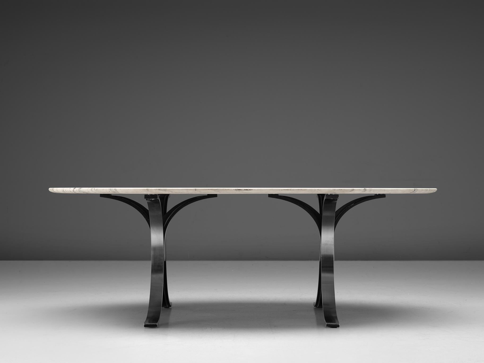Osvaldo Borsani and Eugenio Gerli for Tecno, dining table, model T102, marble, wood, aluminum,  Italy, 1964. 

The designer duo created an outstanding piece of furniture that deserves a prominent place in one's living room. The tabletop owns its