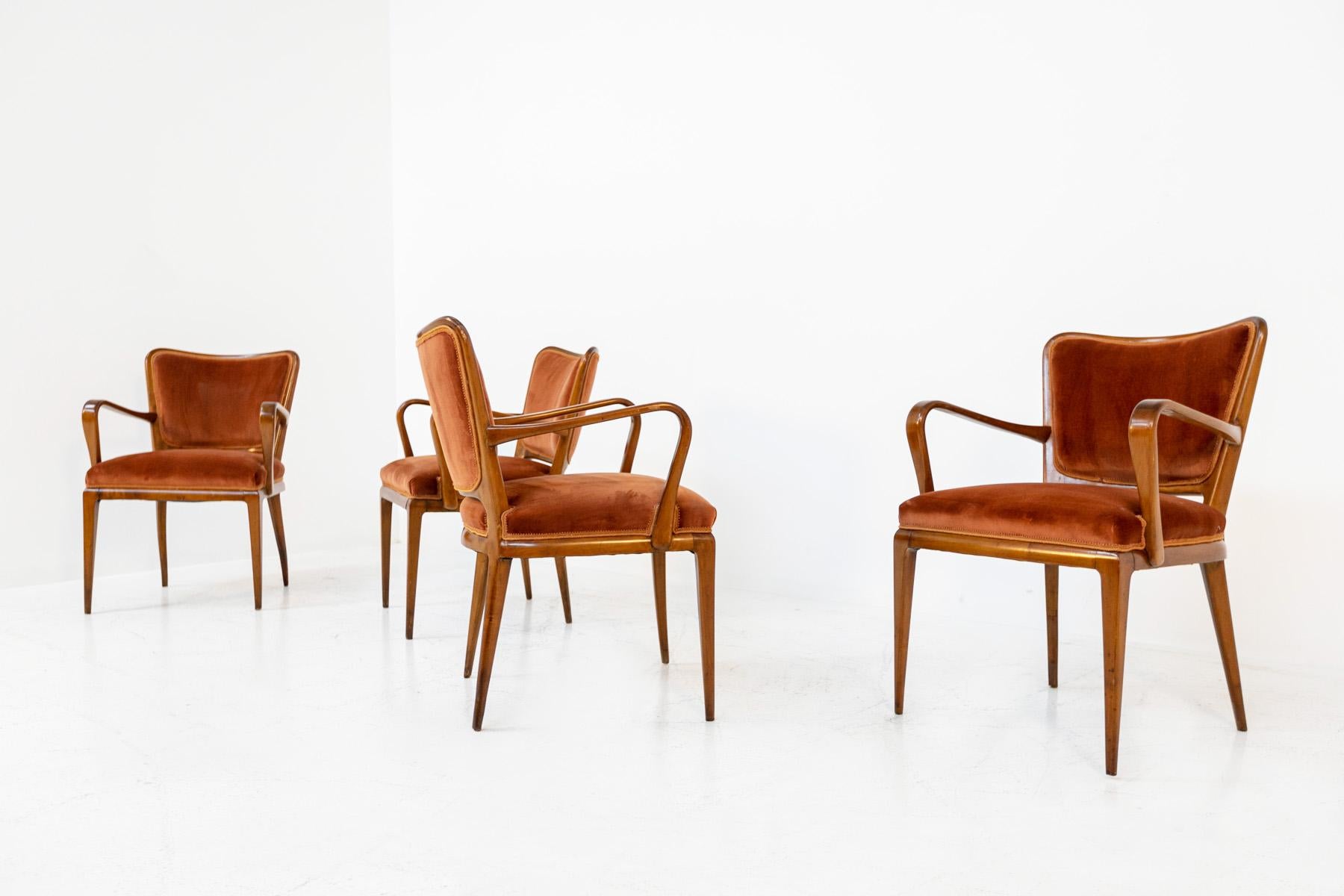 Elegant set of four Italian armchairs by Osvaldo Borsani for ABV from the 1950s. The armchairs are the 5700 model and were first designed for the Caminada and Leuthold house. The simple, sleek lines are striking from its modernity that is closer to