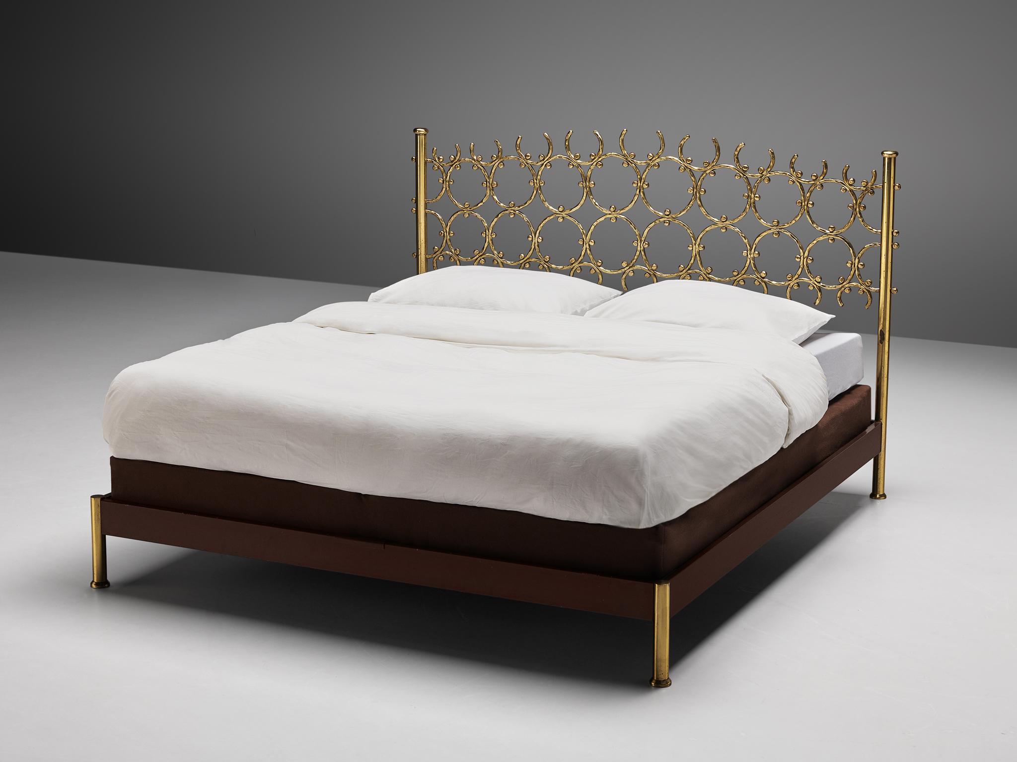 Osvaldo Borsani and Arnaldo Pomodoro, queen size bed, brass and steel, Italy, circa 1960.

A rare and elegant bed with headboard from the Italian designer Osvaldo Borsani and sculptor Arnaldo Pomodoro. Between 1958 and 1962, Borsani and Pomodoro