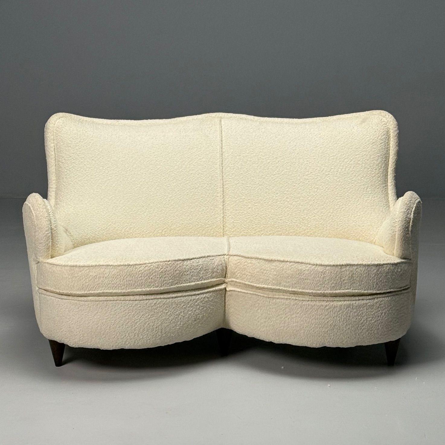 
Attribution Osvaldo Borsani, modernité italienne du milieu du siècle, canapé ou sofa en forme de cœur, bouclier blanc, bois, années 1950.



Cet exquis canapé en forme de cœur, conçu dans le style d'Osvaldo Borsani, incarne l'essence du design
