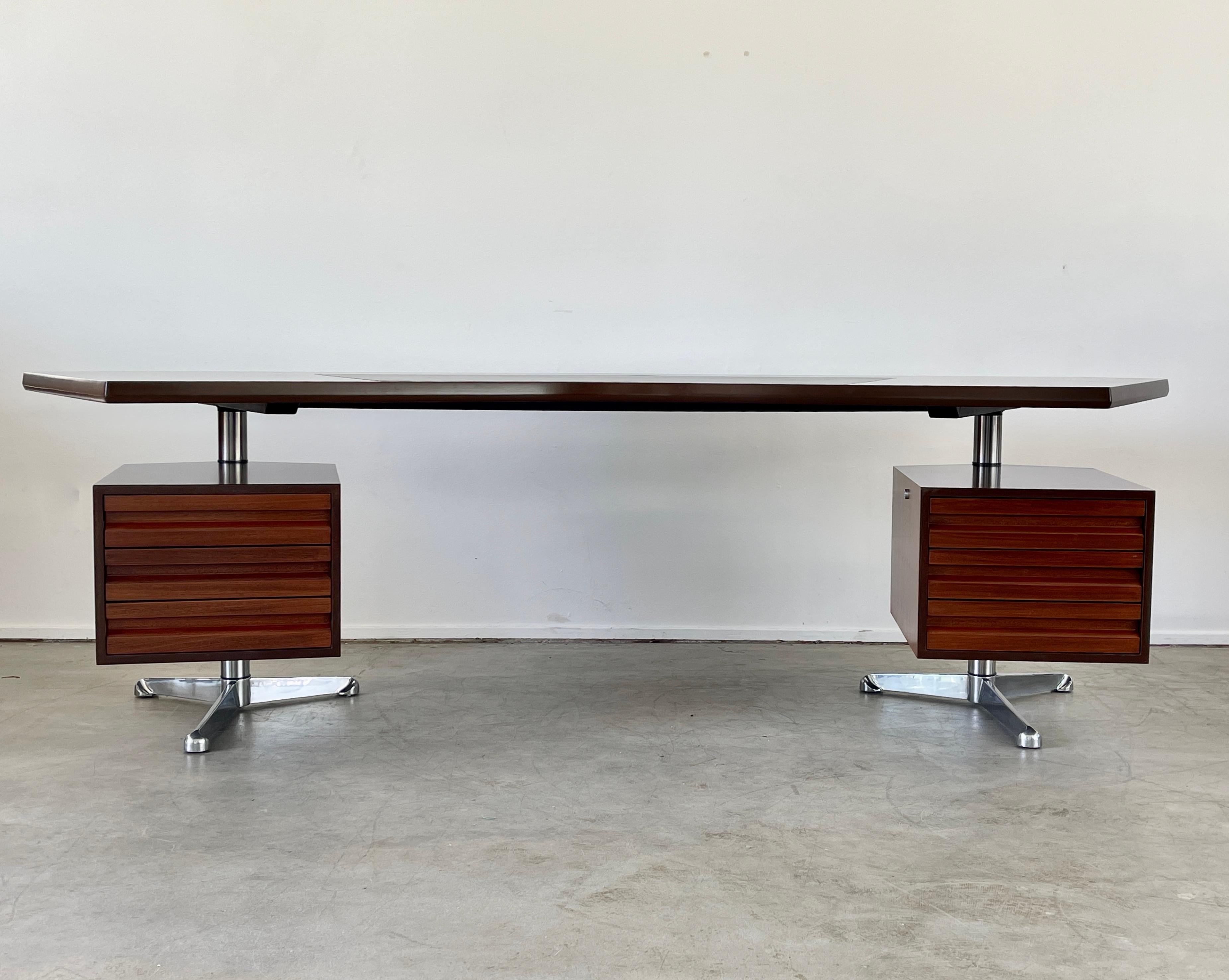 Fantastic boomerang desk by Osvaldo Borsani with leather blotter insert. 
New refinished in french lacquer finish with 2 pedestals that swivel on brushed nickel bases.
     