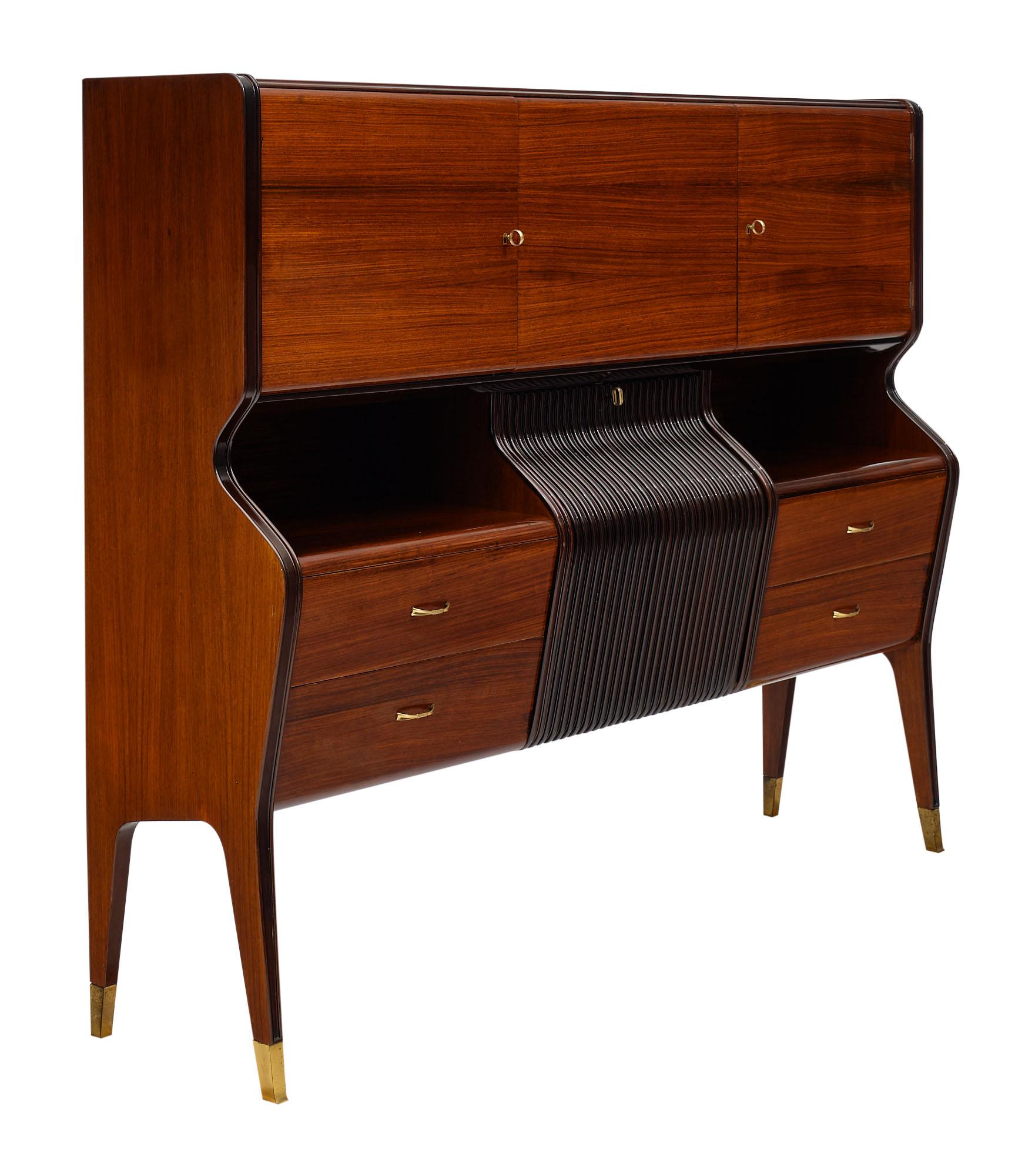 Buffet enfilade with bar from Italy. This mid-century piece is by Osvaldo Borsani and made of Brazilian rosewood, tinted rosewood, and satin wood interior. This spectacular cabinet features ample storage in its base and full bar with glass shelves