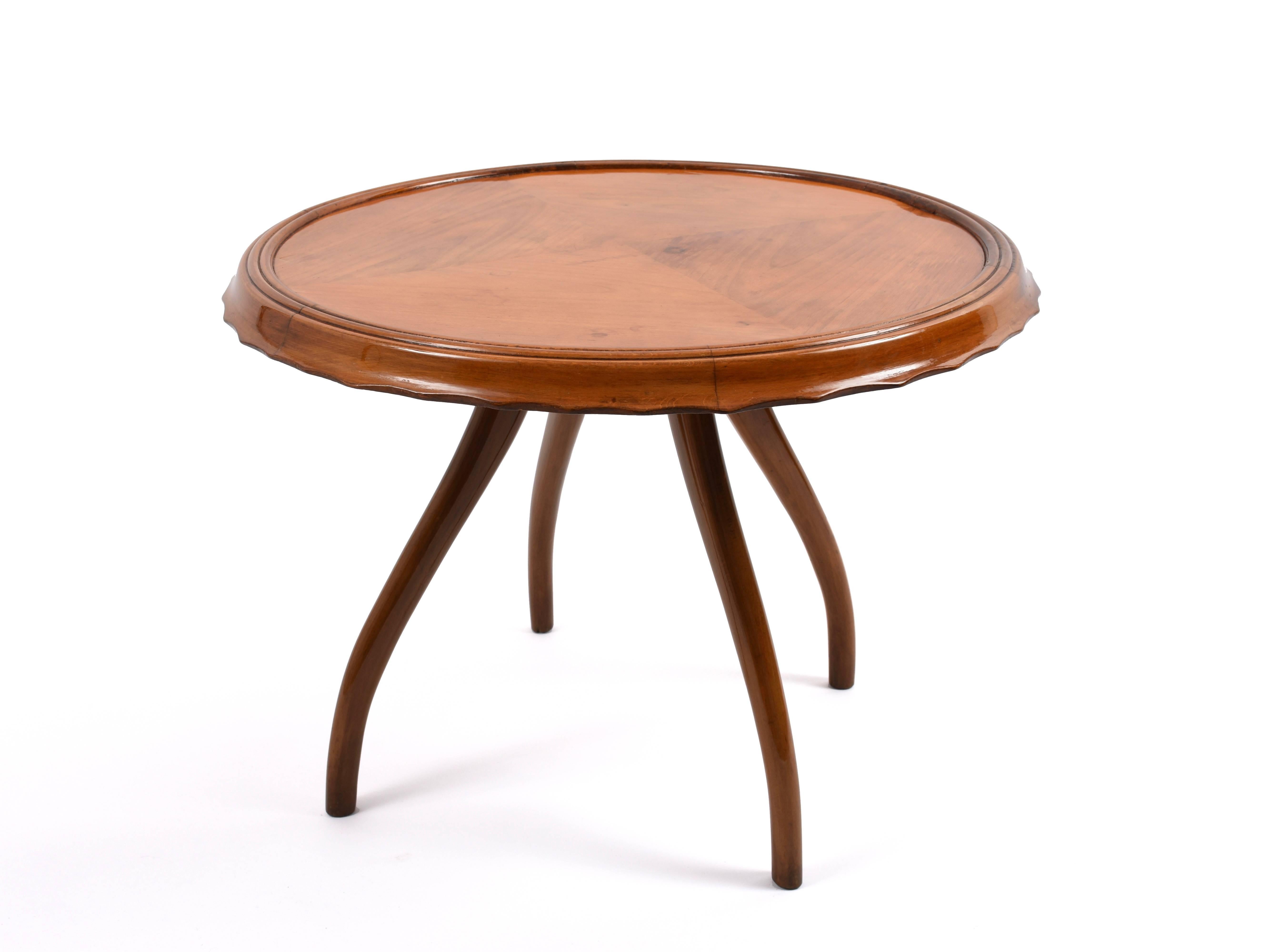 Round cherrywood side table, 1940s. In very good condition.