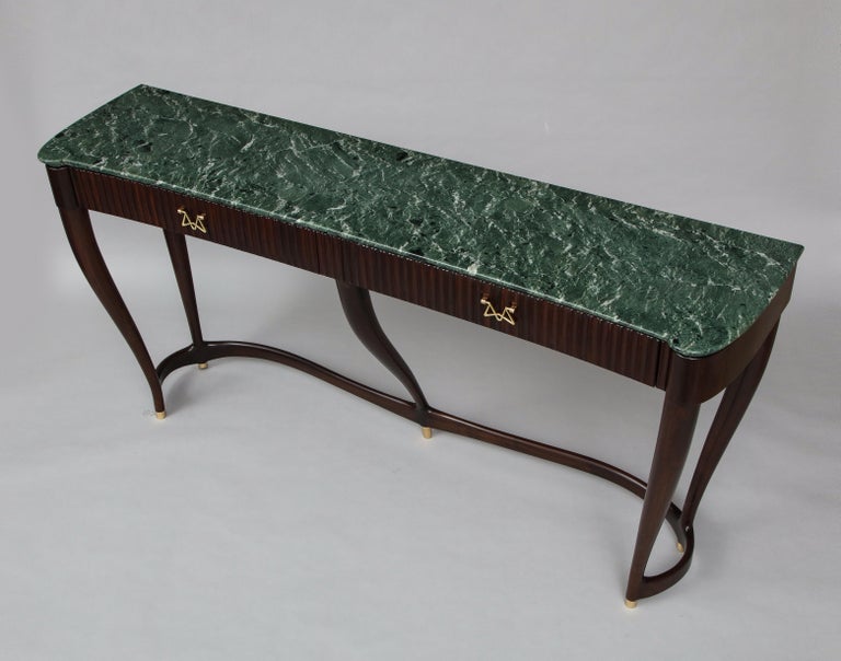 Rare console table #7103 by Osvaldo Borsani. Two-drawer console table produced by Arredamenti Borsani Varedo. Mahogany, rosewood, brass, and figured green marble top. Fully restored and retains an original ABV label. Documentation: Authenticated by