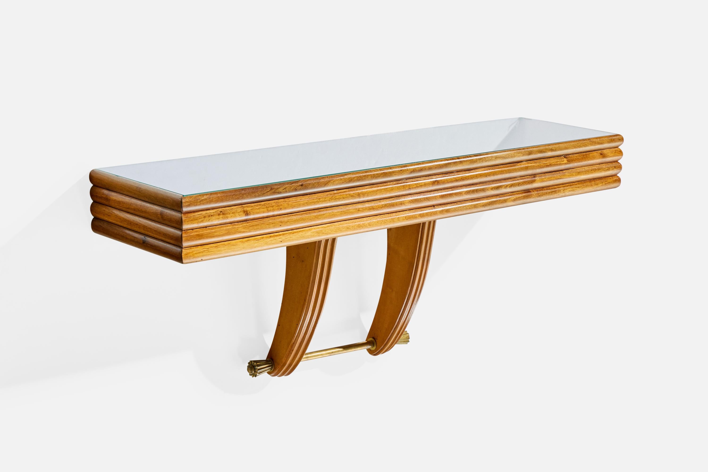 A wall-mounted wood, brass and mirror glass console table designed by Osvaldo Borsani and produced by ABV Arredamenti Borsani Varedo, Italy, c. 1940s.

Damage right back mirror corner.

Minor wear to wood from normal use.

Patina brass.

Overall