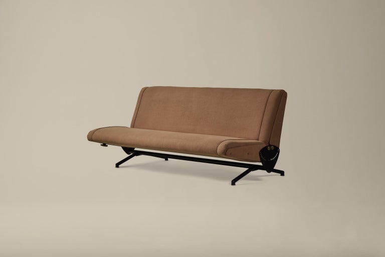 This adjustable reclining sofa-to-daybed was designed by Osvaldo Borsani. The classic Italian mid-century design features an exposed steel adjustment lever. Vintage condition with new cashmere upholstery. Wear consistent with age and use. See images