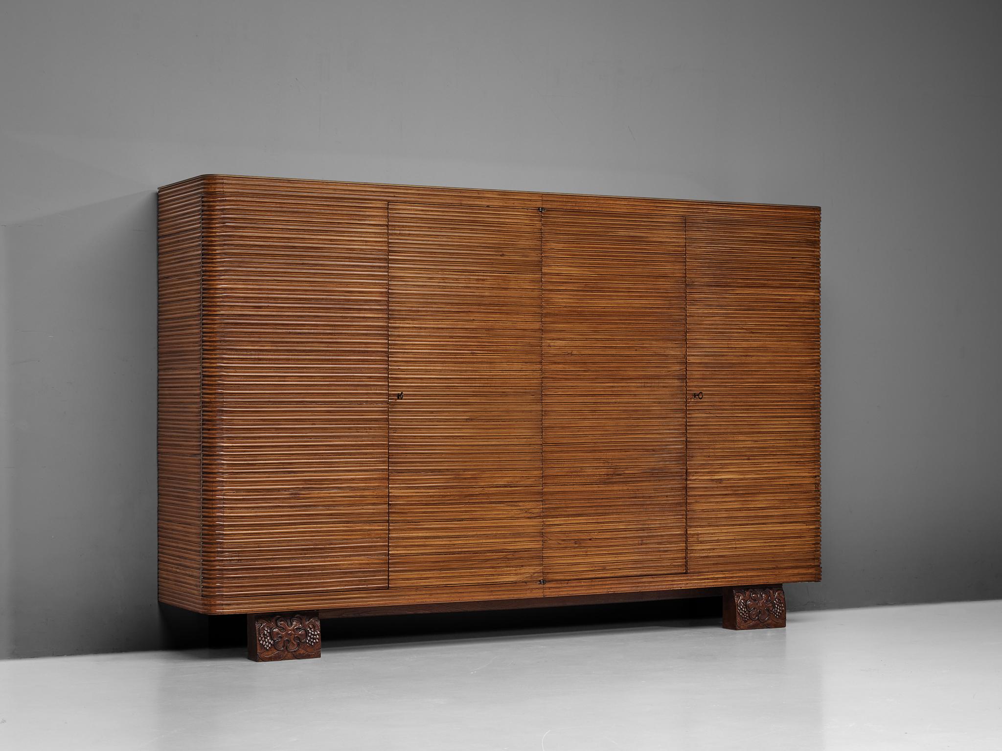Osvaldo Borsani for Arredamenti Borsani Varedo, wardrobe, cherry, maple, glass, Italy, circa 1955. 

This elegant wardrobe, designed by the Italian designer Osvaldo Borsani for ABV Arredamenti Borsani Varedo, exemplifies the exquisite craftsmanship