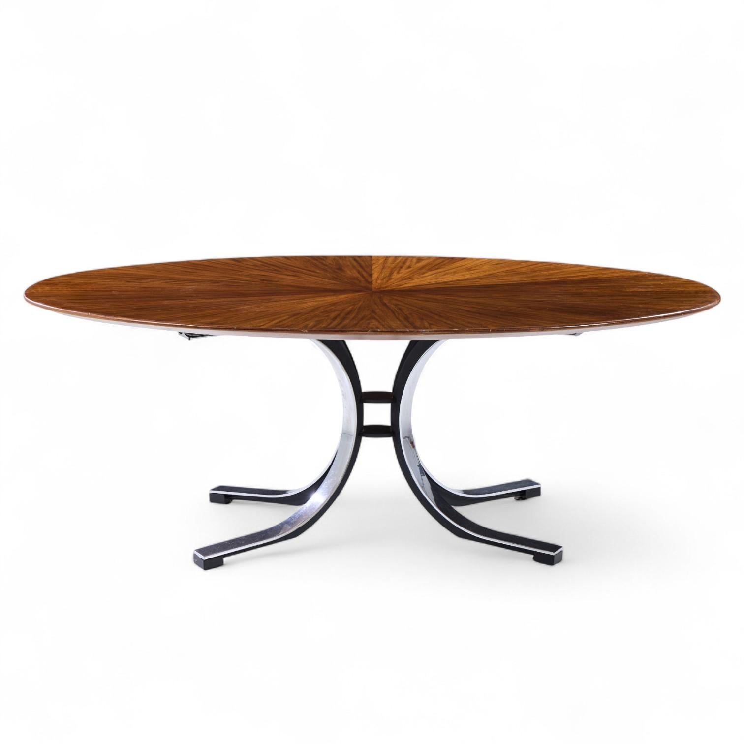 Osvaldo Borsani for Stow & Davis Mid Century Starburst Walnut and Steel Oval Dining Table

This dining table measures: 78.5 wide x 48.5 deep x 28.5 inches high, with a chair clearance of 27 inches

Great Vintage Condition - Minor Finish Wear and