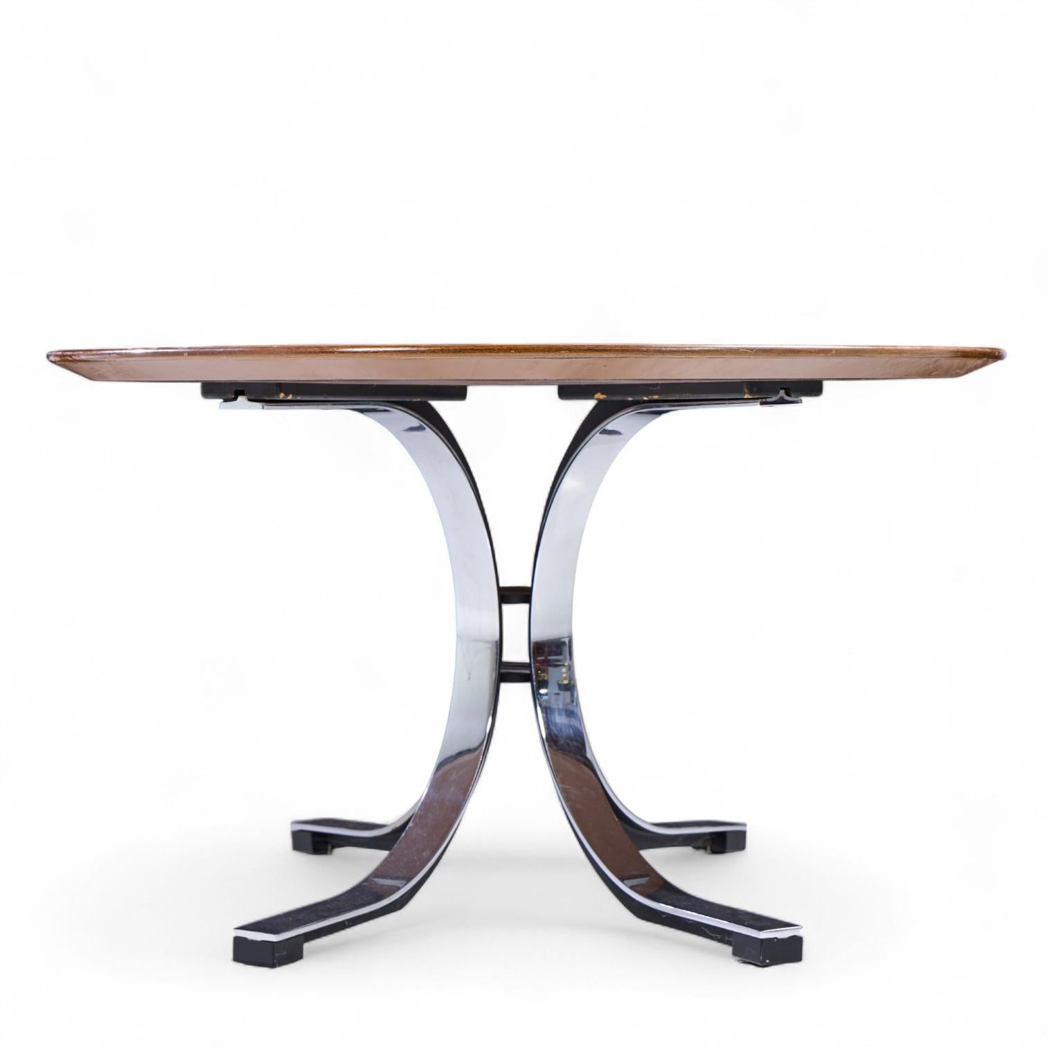 Osvaldo Borsani for Stow & Davis Starburst Walnut and Steel Oval Dining Table Estadounidense en venta