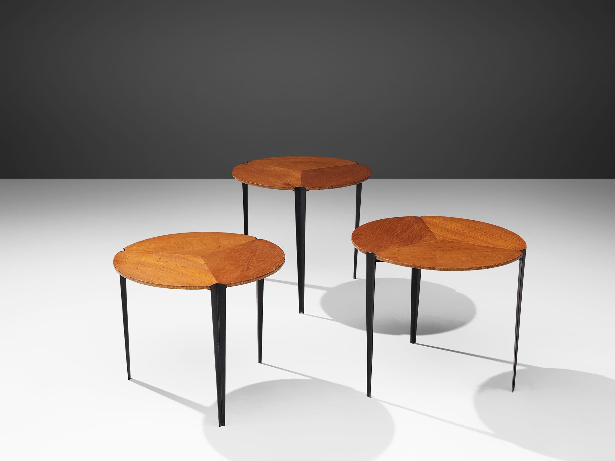 Osvaldo Borsani for Tecno, set of three nesting tables model 'T61', teak and metal, Italy, 1957

Elegant set of three nesting tables, designed by Osvaldo Borsani and produced by Tecno. Each table has a circular table top of teak veneer, that is