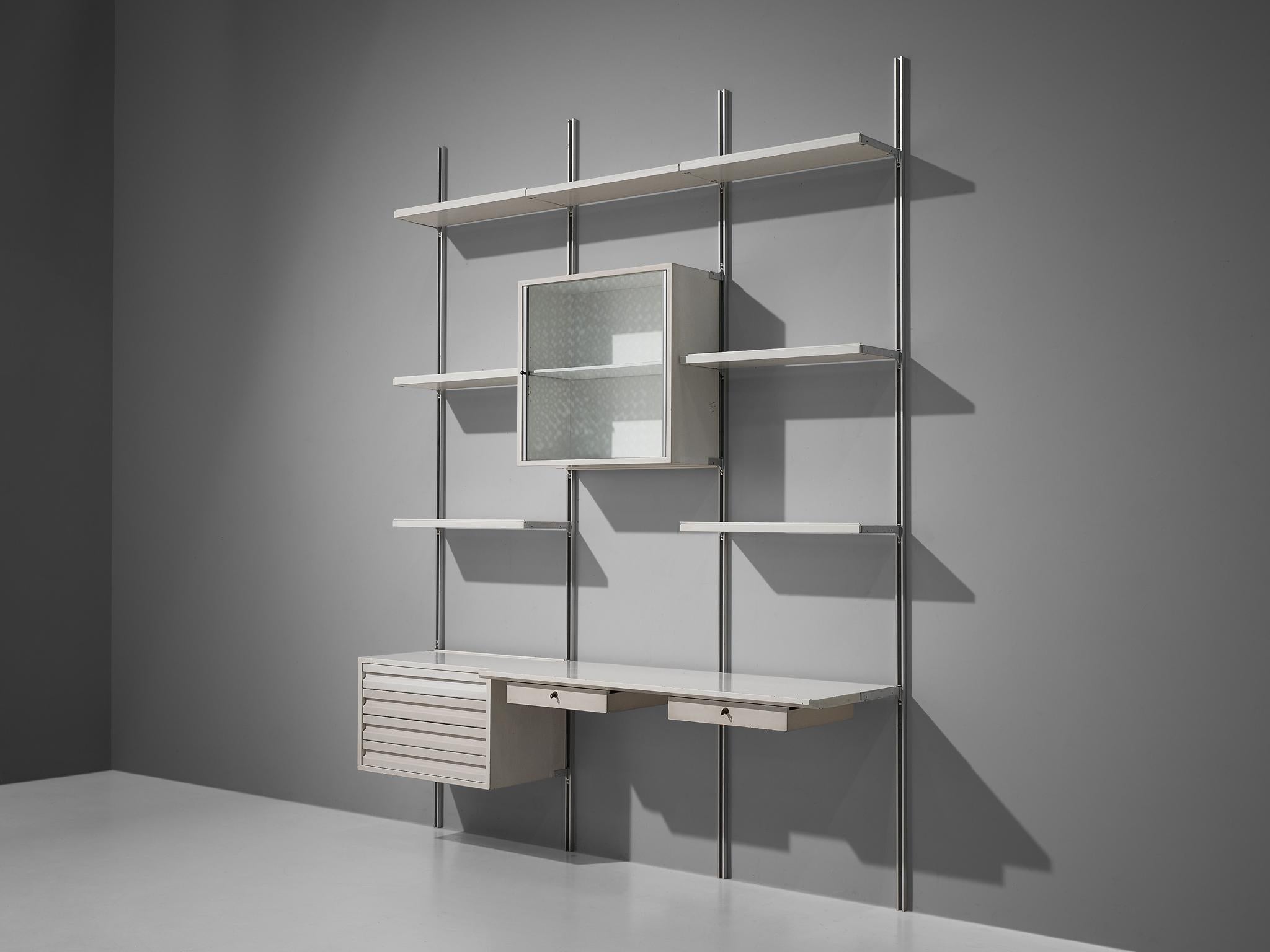 Osvaldo Borsani for Tecno, bookcase or wall unit, metal, Italy, 1950s.

This wall-mounted shelving unit is three sections large. The order and lay out of this unit is adjustable and can be placed according to your own taste or style. According to
