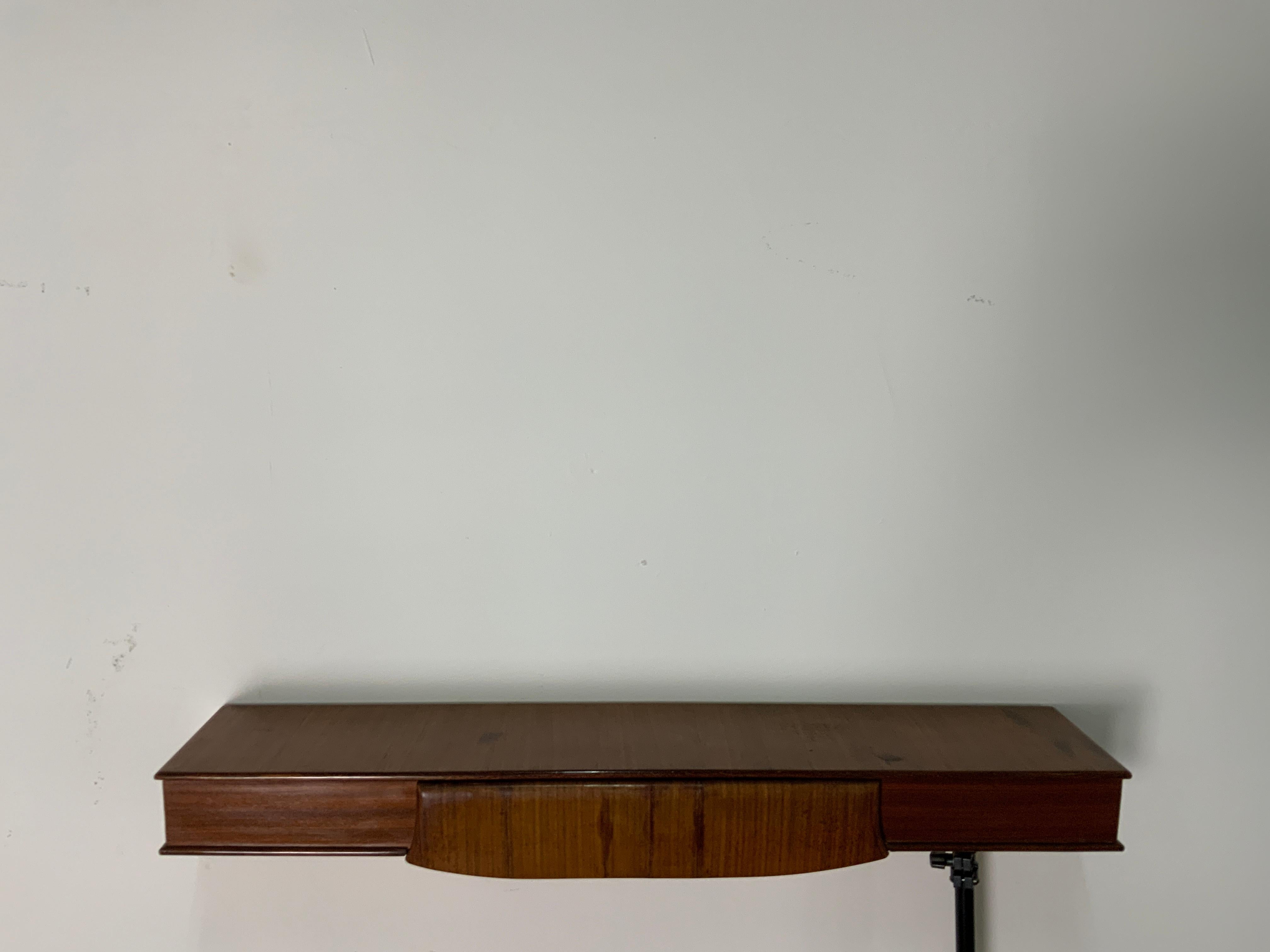 Hanging console with drawer from the 1960s attributed to the Italian designer Osvaldo Borsani.