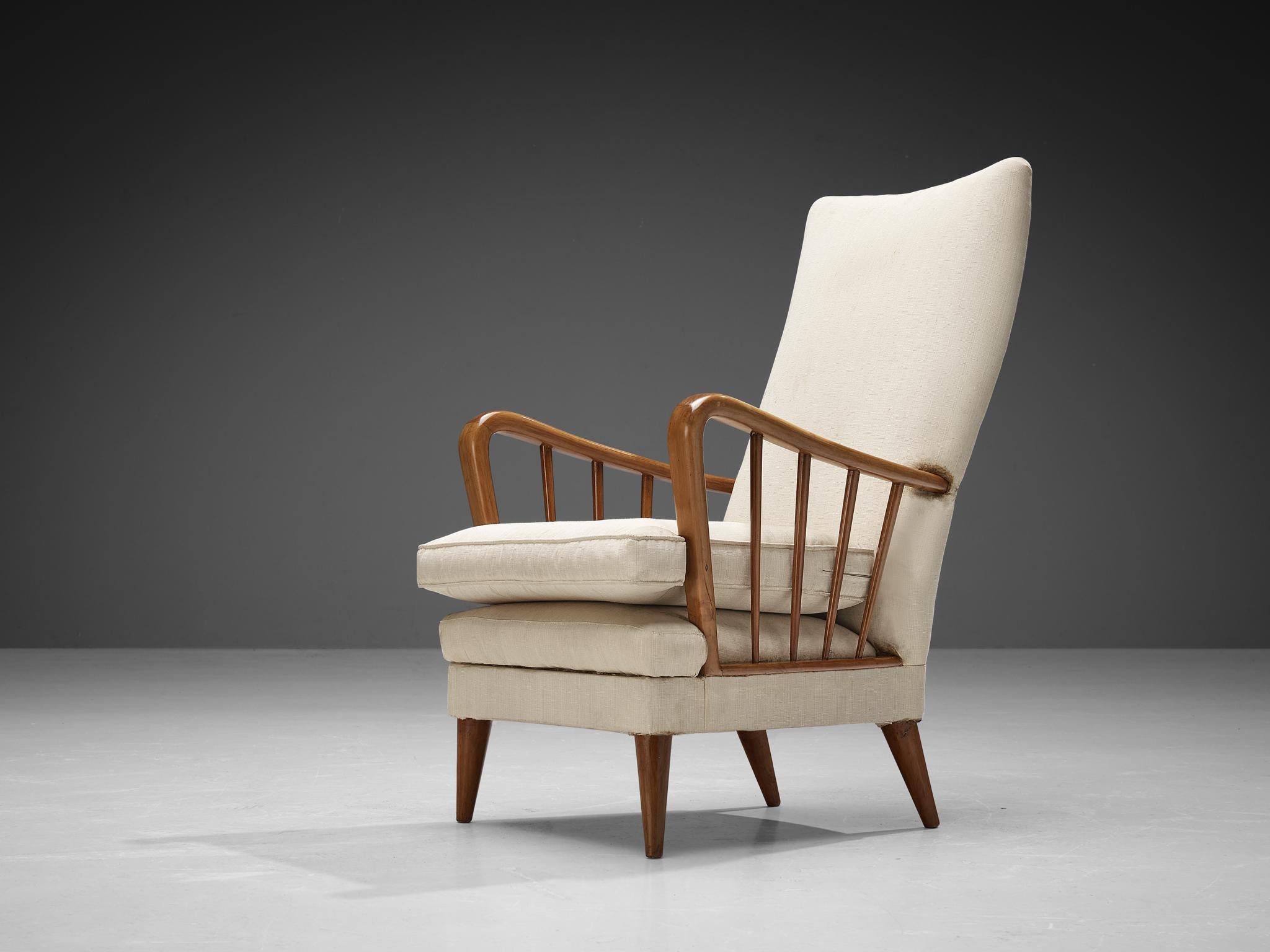 Osvaldo Borsani for ABV, lounge chair, model 6553, walnut, fabric, Italy, 1945

This elegant lounge chair model 6553 is designed by Osvaldo Borsani and embodies a splendid construction of subtle lines and curvaceous shapes. Remarkable detail and the