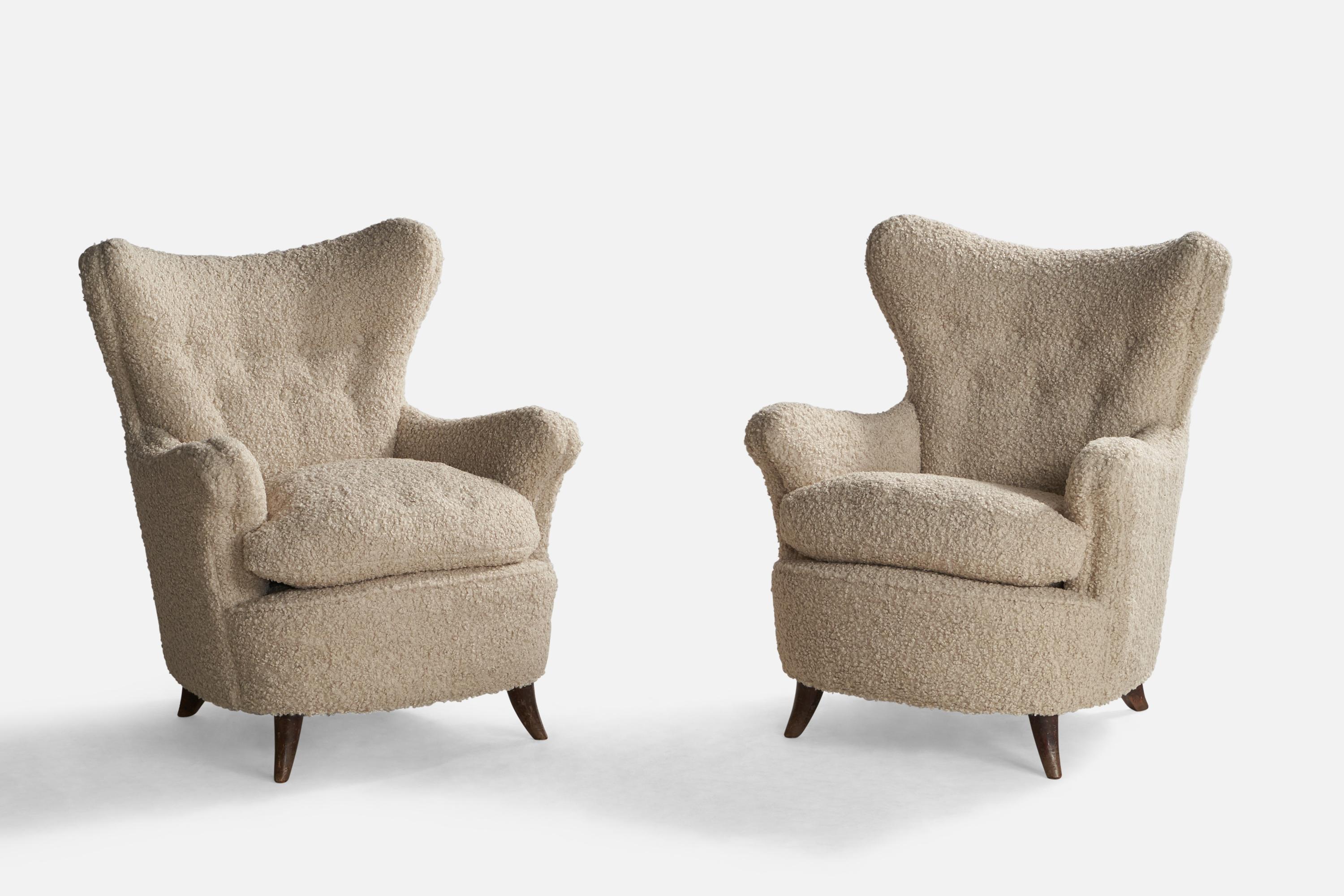 A pair of dark-stained wood and off-white bouclé fabric lounge chairs designed by Osvaldo Borsani and produced by Arredamenti Borsani, Italy, 1940s.

Seat height: 18.75”