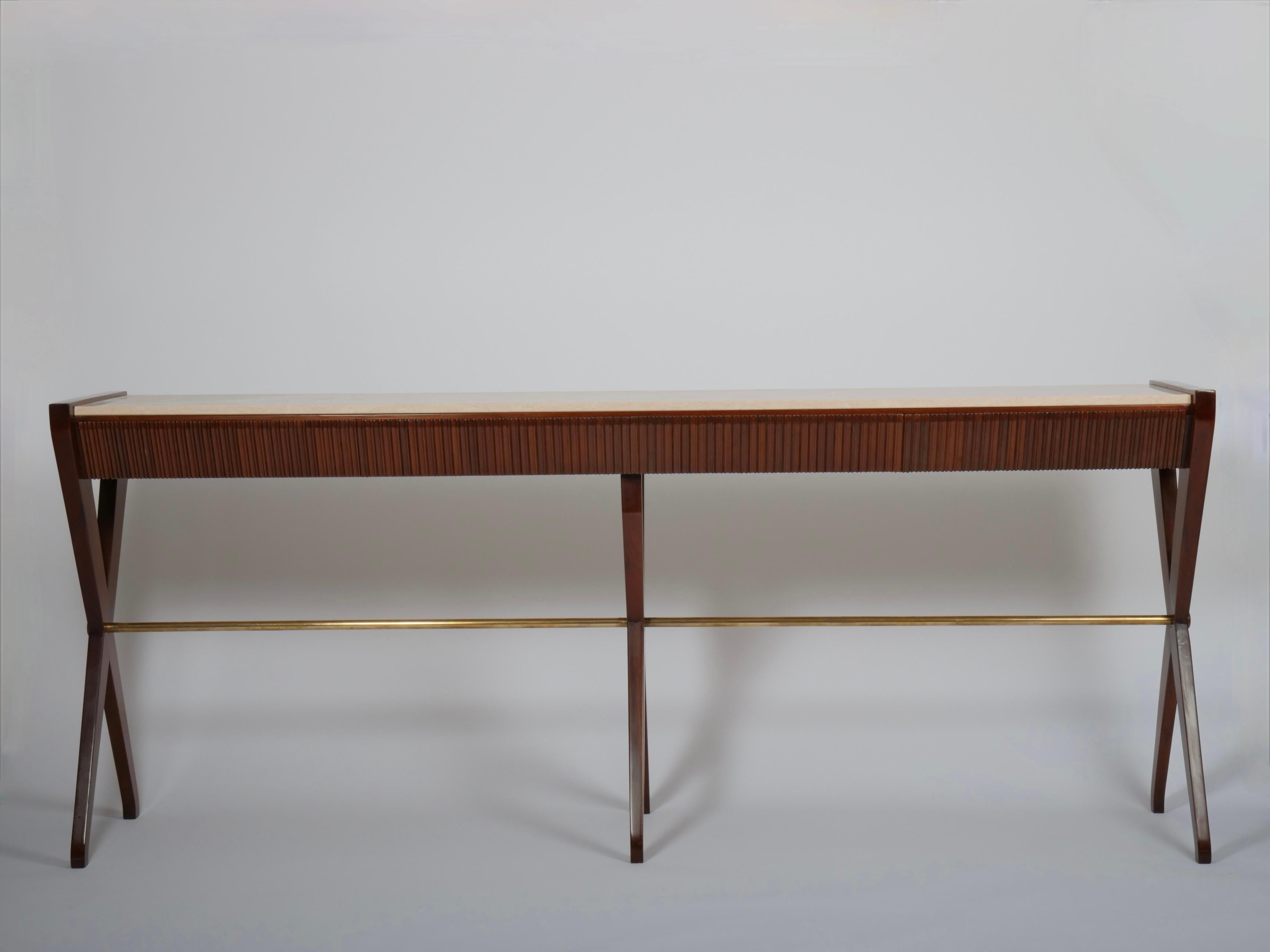 Sideboard / console by Osvaldo Borsani. Italy c1950

Mahogany with brass elements and pale pink marble.
Four drawers. 



