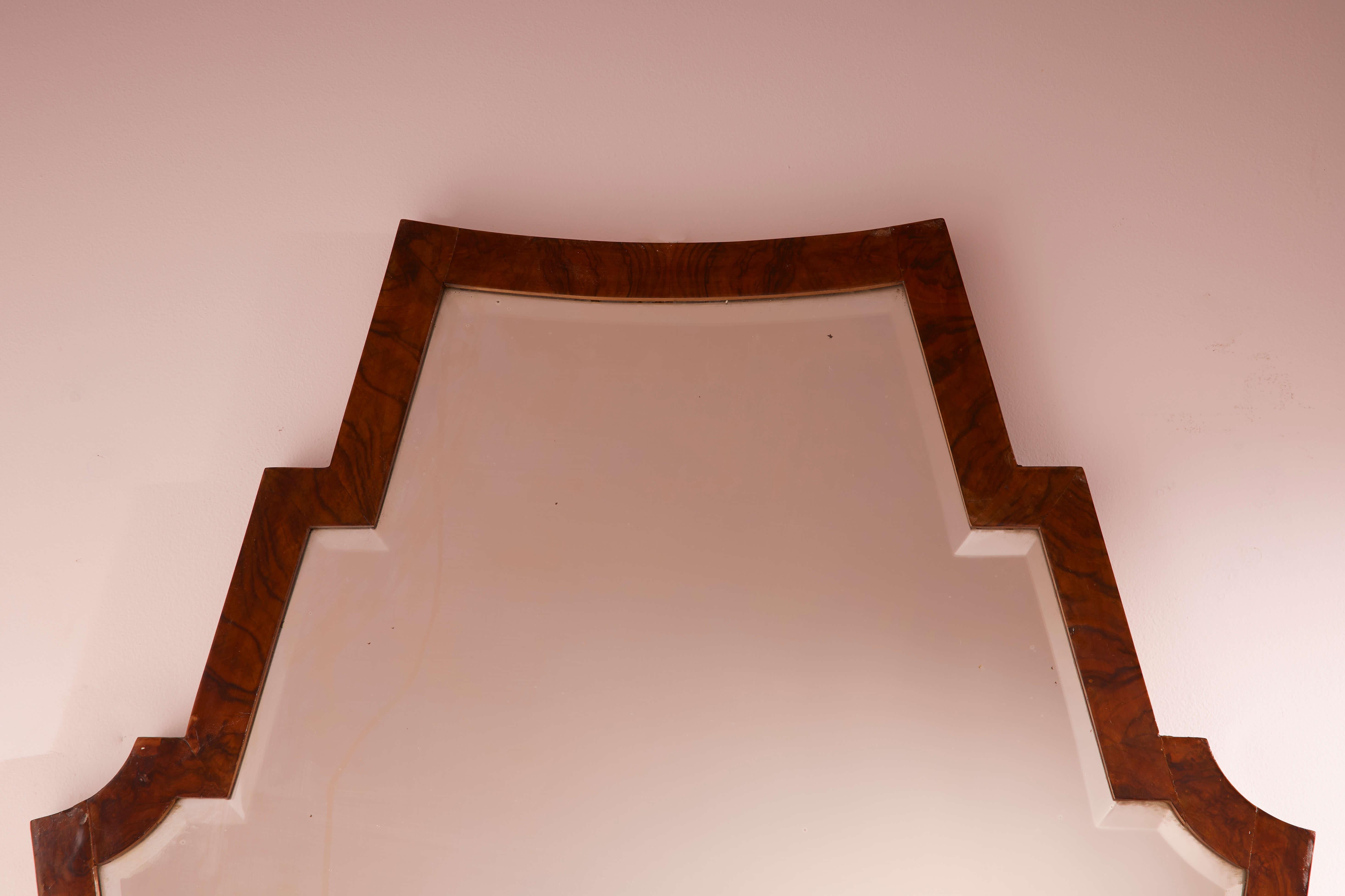 Mirror with walnut frame and shaped mirrored glass, Italy, 1940s For Sale 1