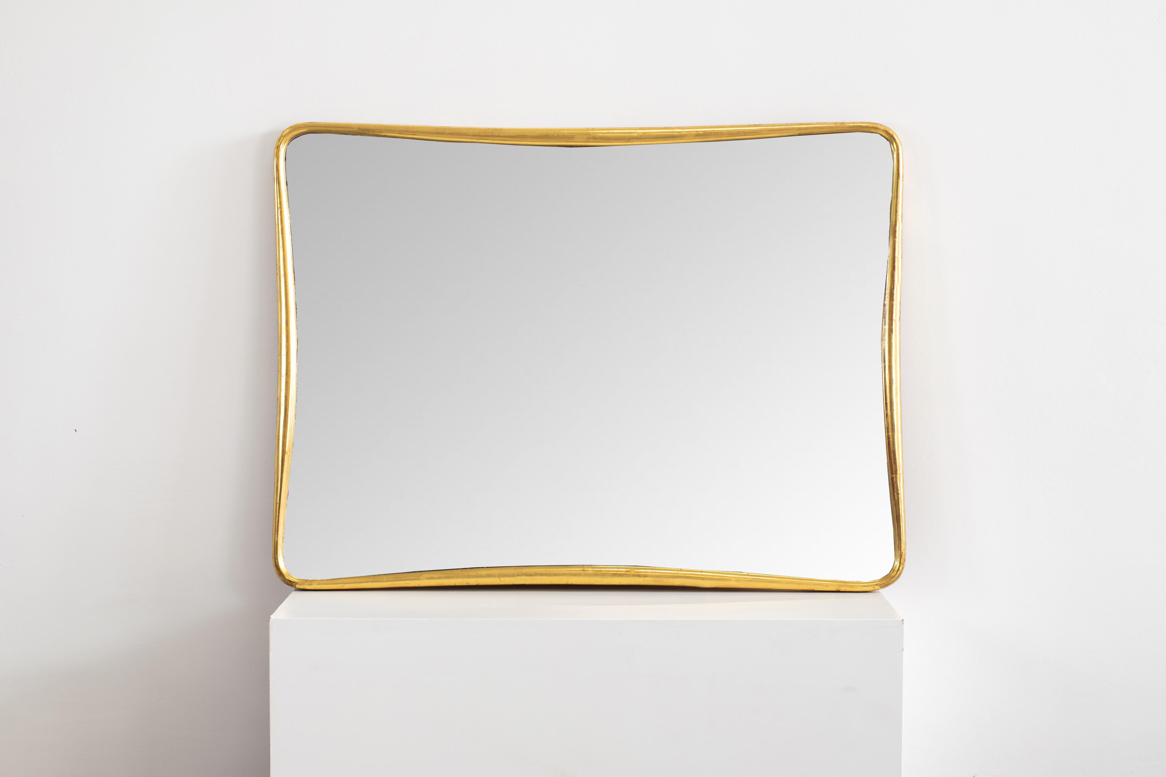 Osvaldo Borsani, mirrored crystal with a wooden golden frame.
ABV production, the 1950s.

