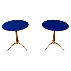 Osvaldo Borsani, pair of coffee tables, blue glass and golden brass, circa 1960.