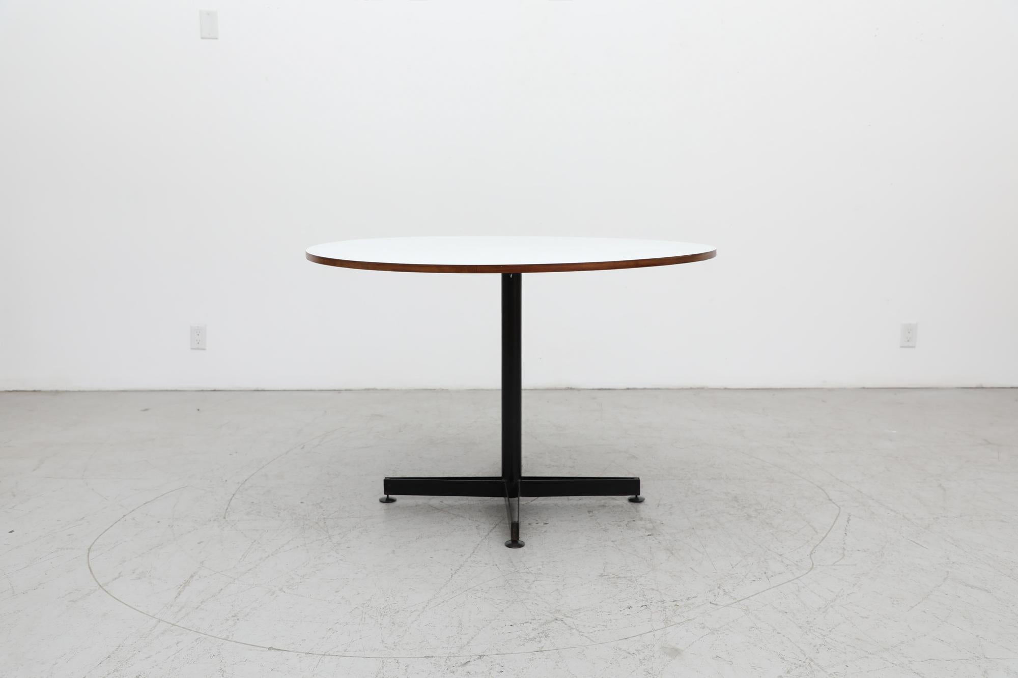 Italian Osvaldo Borsani Round Pedestal Table White Laminate Top, Teak Edge & Black Base For Sale