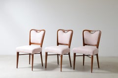 Osvaldo Borsani set of 10 elegant shaped walnut chairs