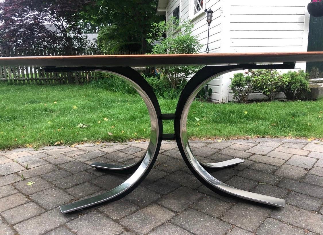  Stow Davis Starburst pattern wood top and chrome base pedestal dining table.

Circa early 1970s and featuring a custom glass topper that sits perfectly on top and has helped preserve this masterwork. Wood and chrome present excellently and top is