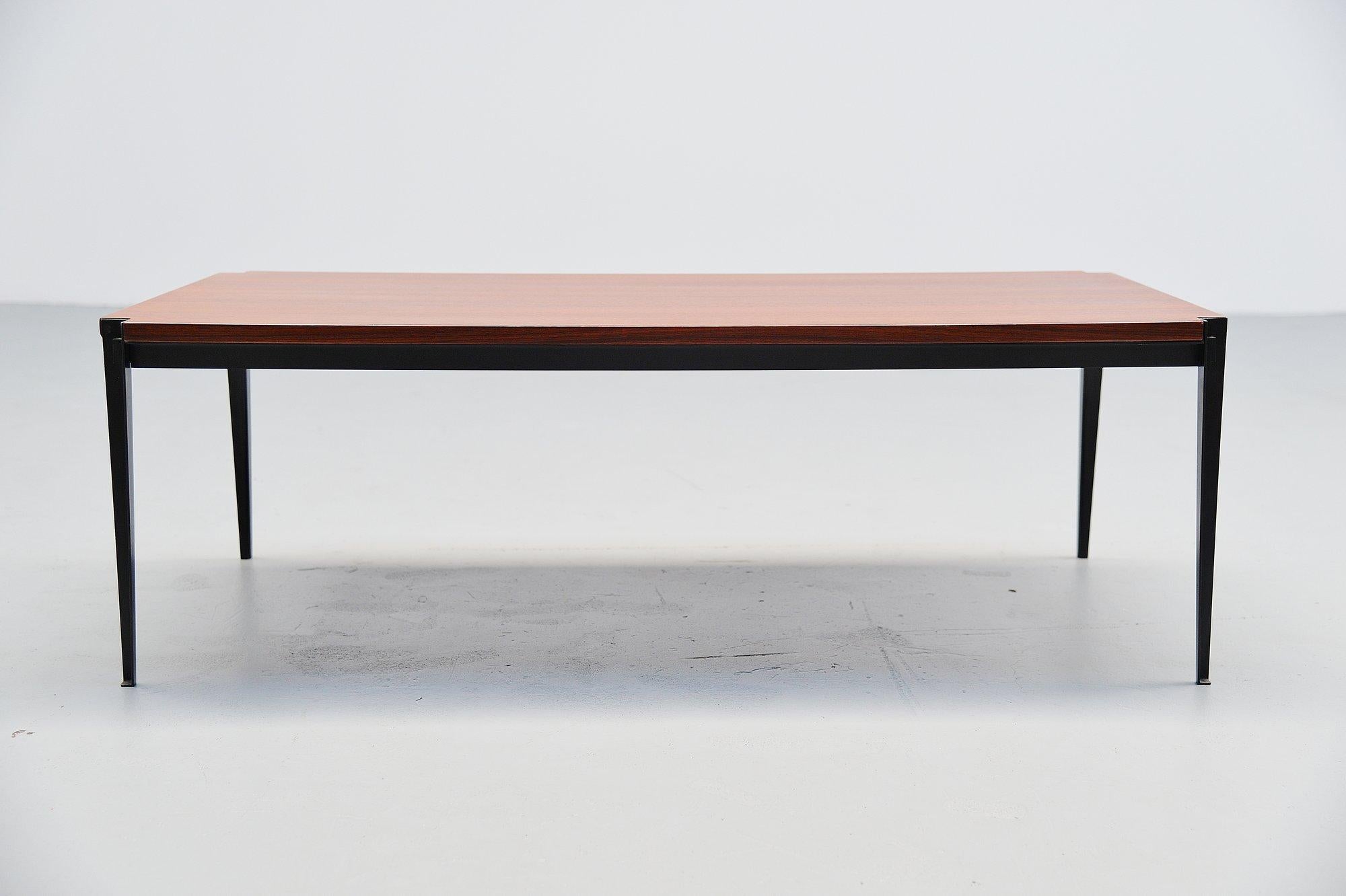 Minimalistic cofee table model T61B designed by Osvaldo Borsani and manufactured by Tecno, Italy 1957. This table has black painted metal frame and a rosewood top. The simplicity of form deriving from the clarity of the structural system makes this