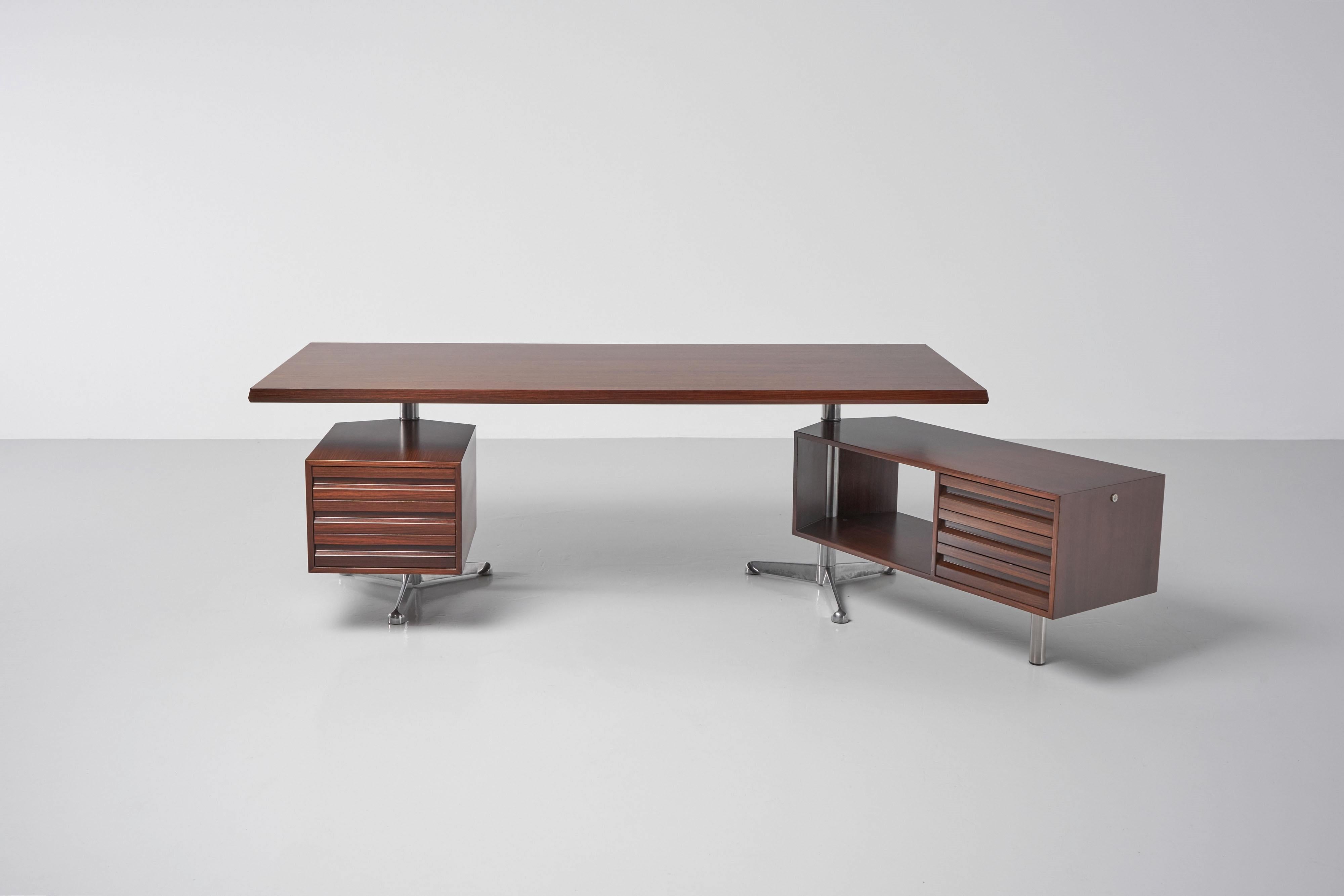 Fantastic model T95 office desk designed by Osvaldo Borsani and manufactured by Tecno, Italy 1956. The desk has metal and aluminium legs and rosewood veneer top and compartments. The rosewood shows a beautiful grain and deep warm colour. This nice